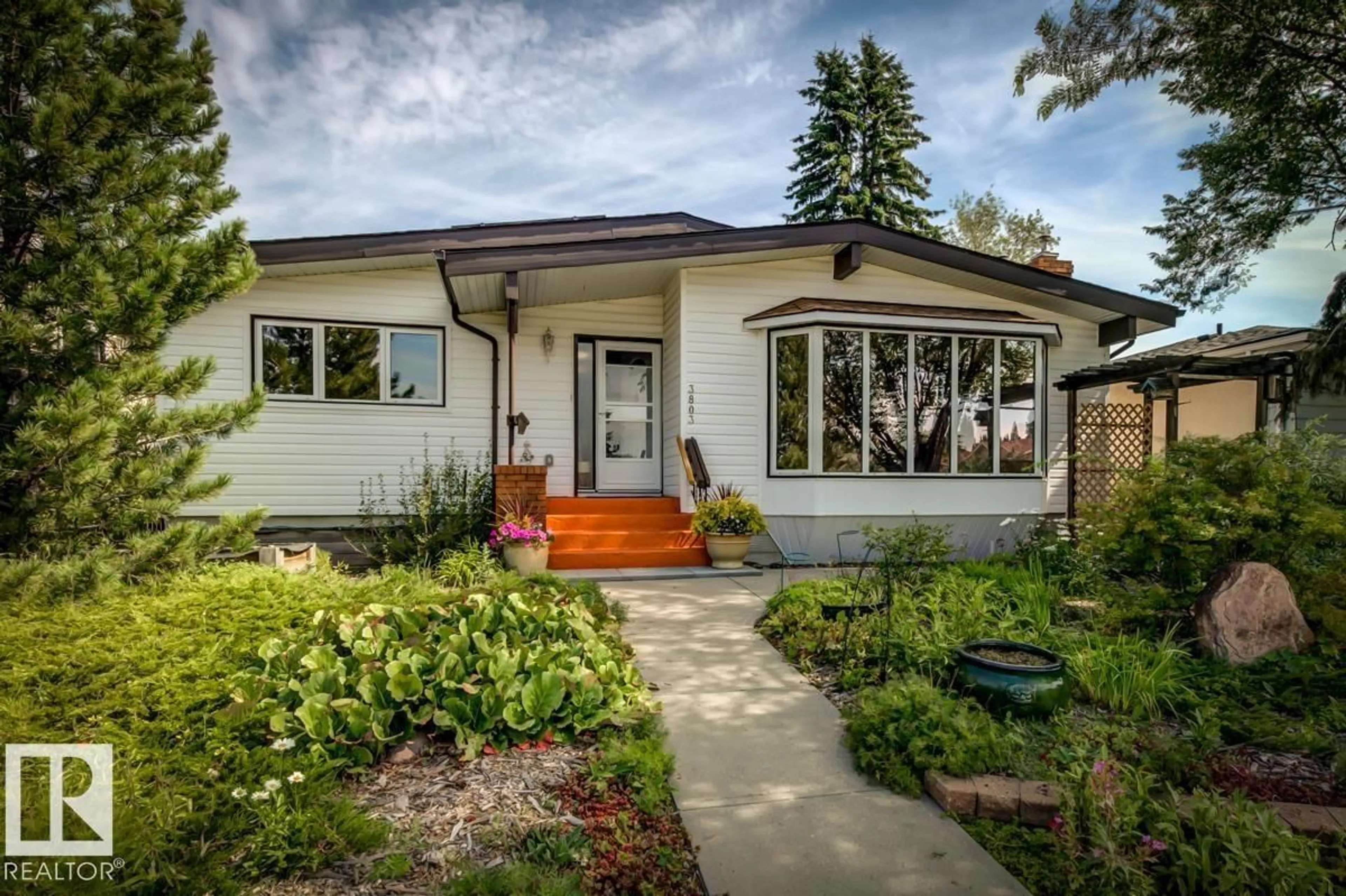 Home with vinyl exterior material, street for 3803 108 ST, Edmonton Alberta T6J1B5