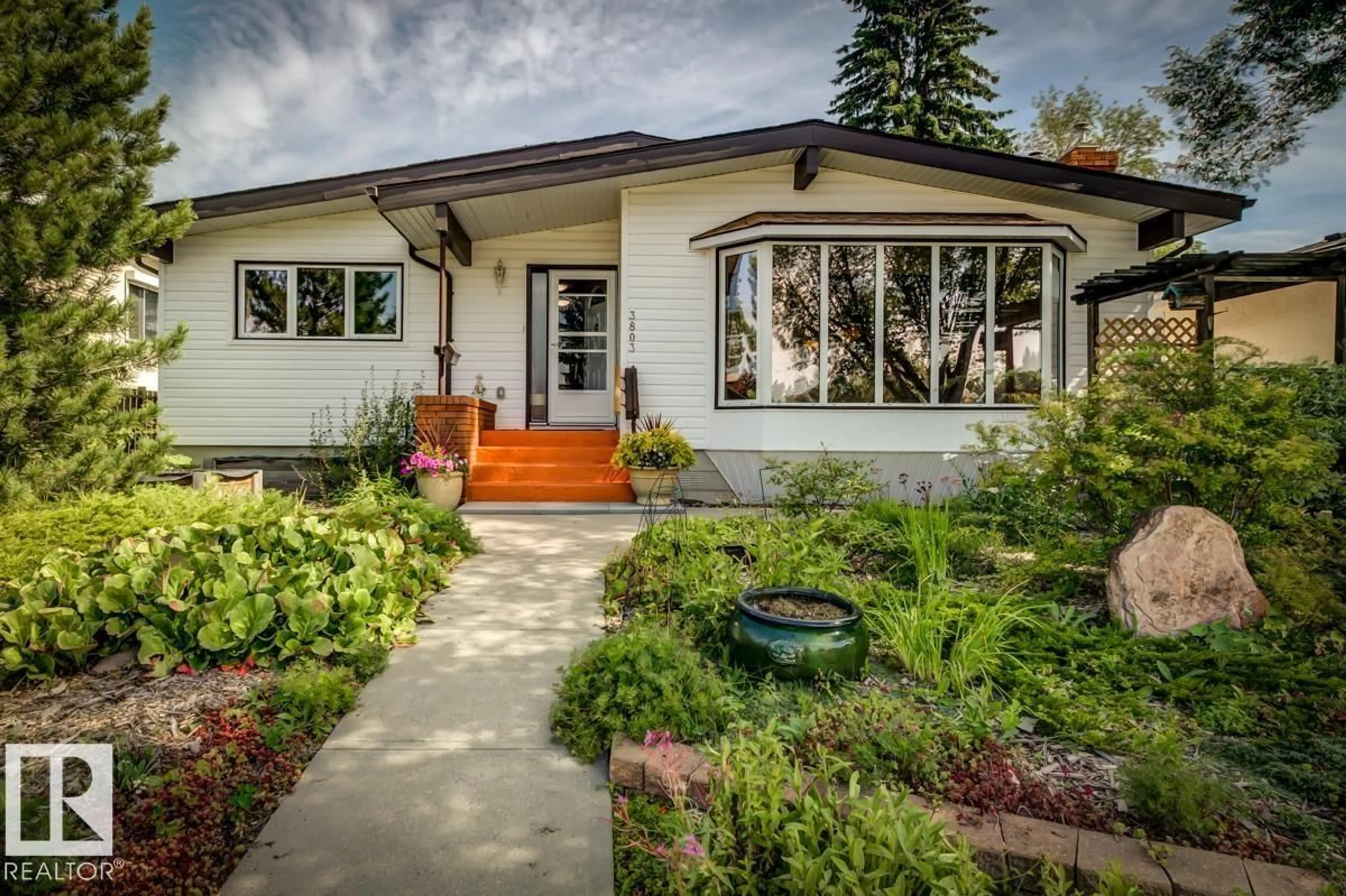 Home with vinyl exterior material, street for 3803 108 ST, Edmonton Alberta T6J1B5