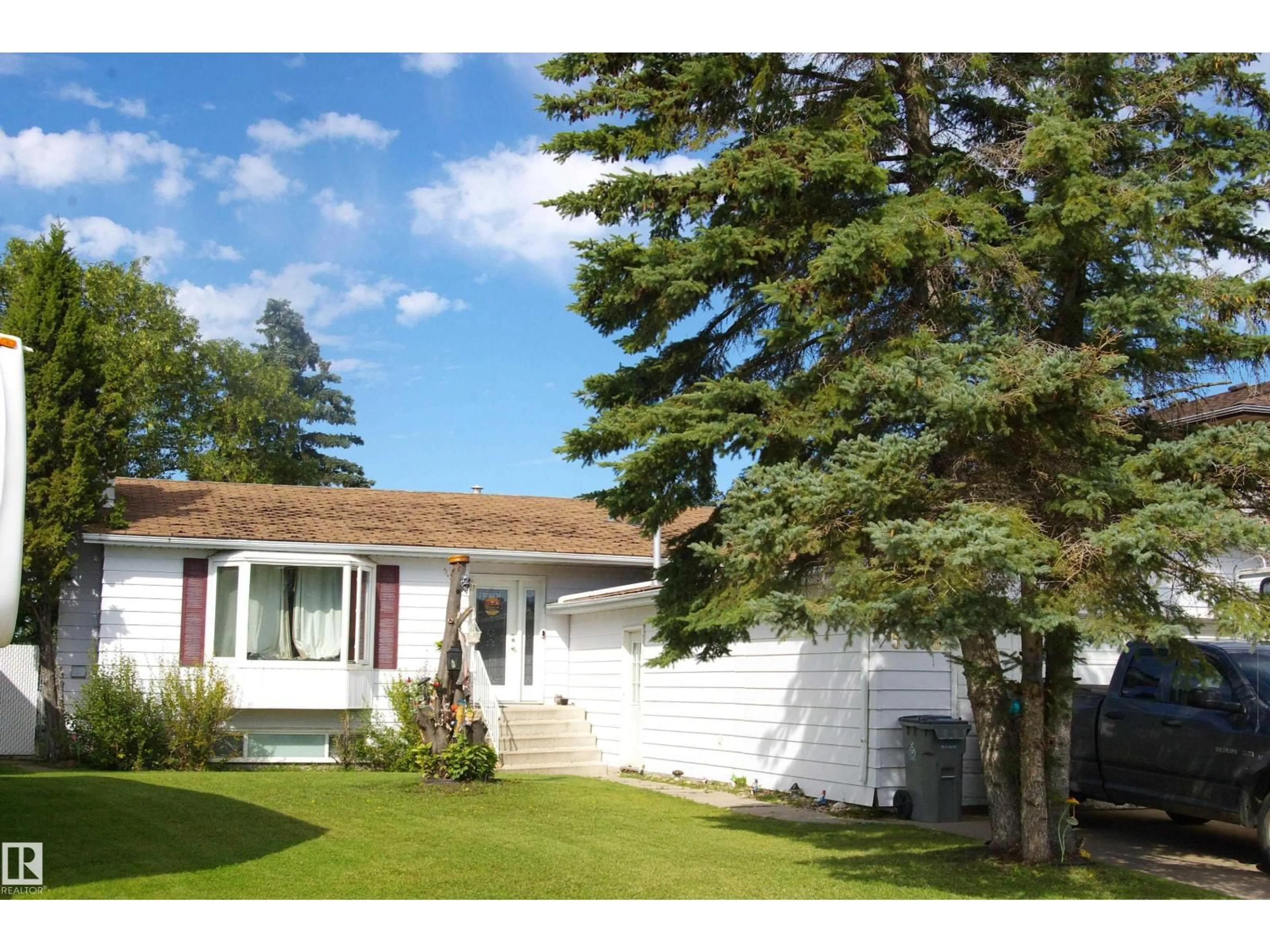 Home with vinyl exterior material, street for 5508 46 ST, Lamont Alberta T0B2R0