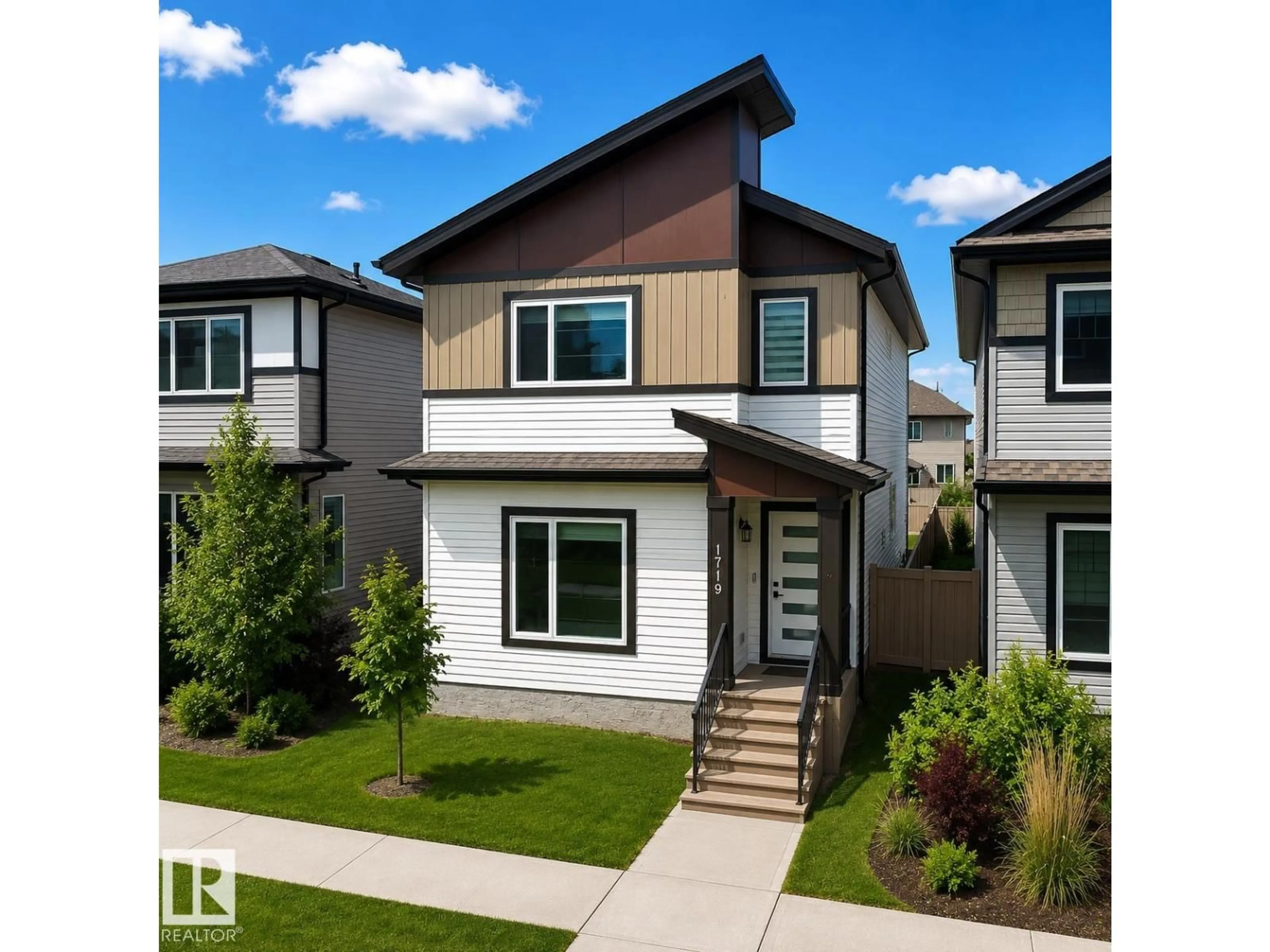 Home with vinyl exterior material, street for NW - 1719 26A ST, Edmonton Alberta T6T2H9