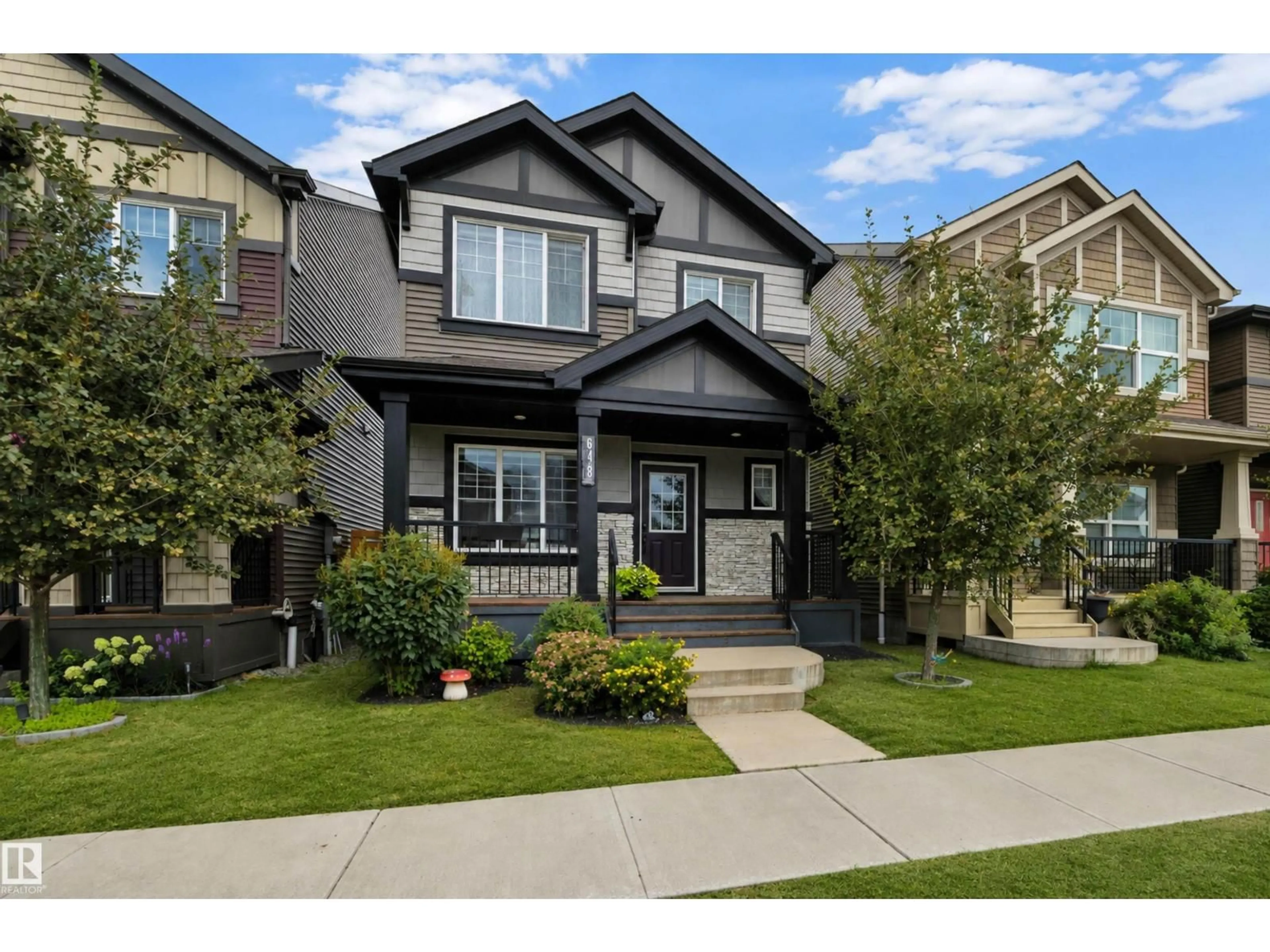 Home with vinyl exterior material, street for 648 ORCHARDS BV, Edmonton Alberta T6X2L4