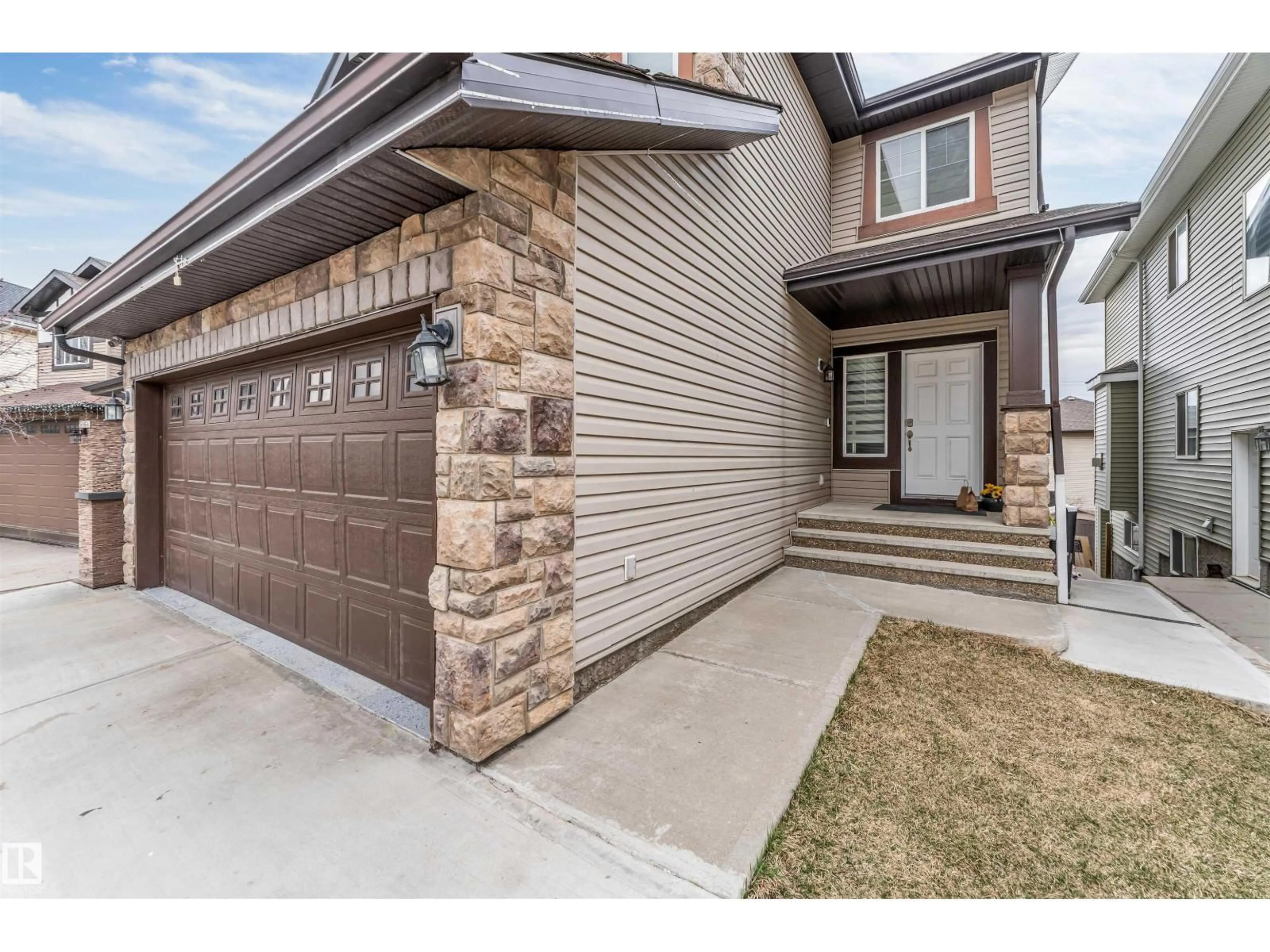 Home with brick exterior material, street for 5156 2 AV SW, Edmonton Alberta T6X0R4