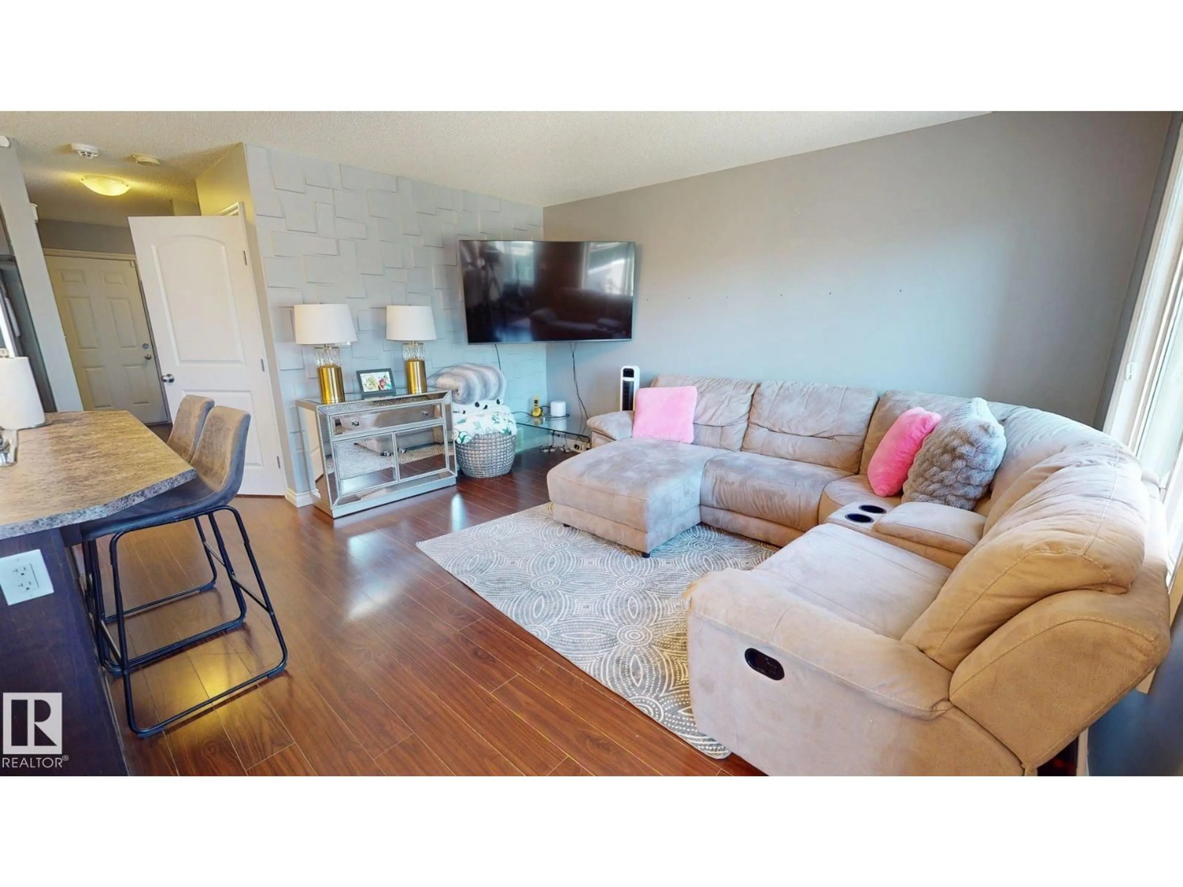 Living room with furniture, wood/laminate floor for 1505 RUTHERFORD RD, Edmonton Alberta T6W1V9