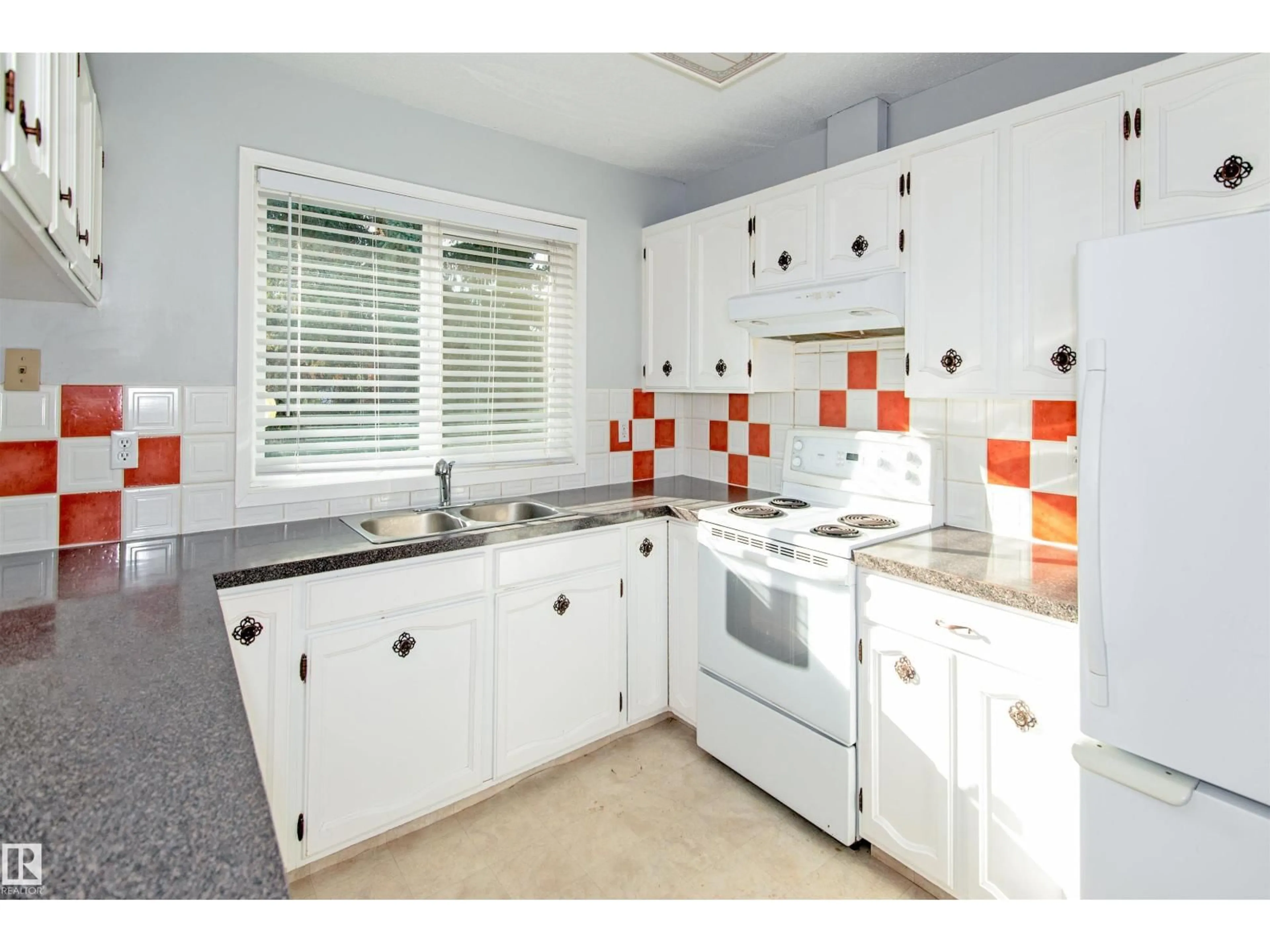 Standard kitchen, ceramic/tile floor for 4411 49 AV, Bonnyville Town Alberta T9N1N5