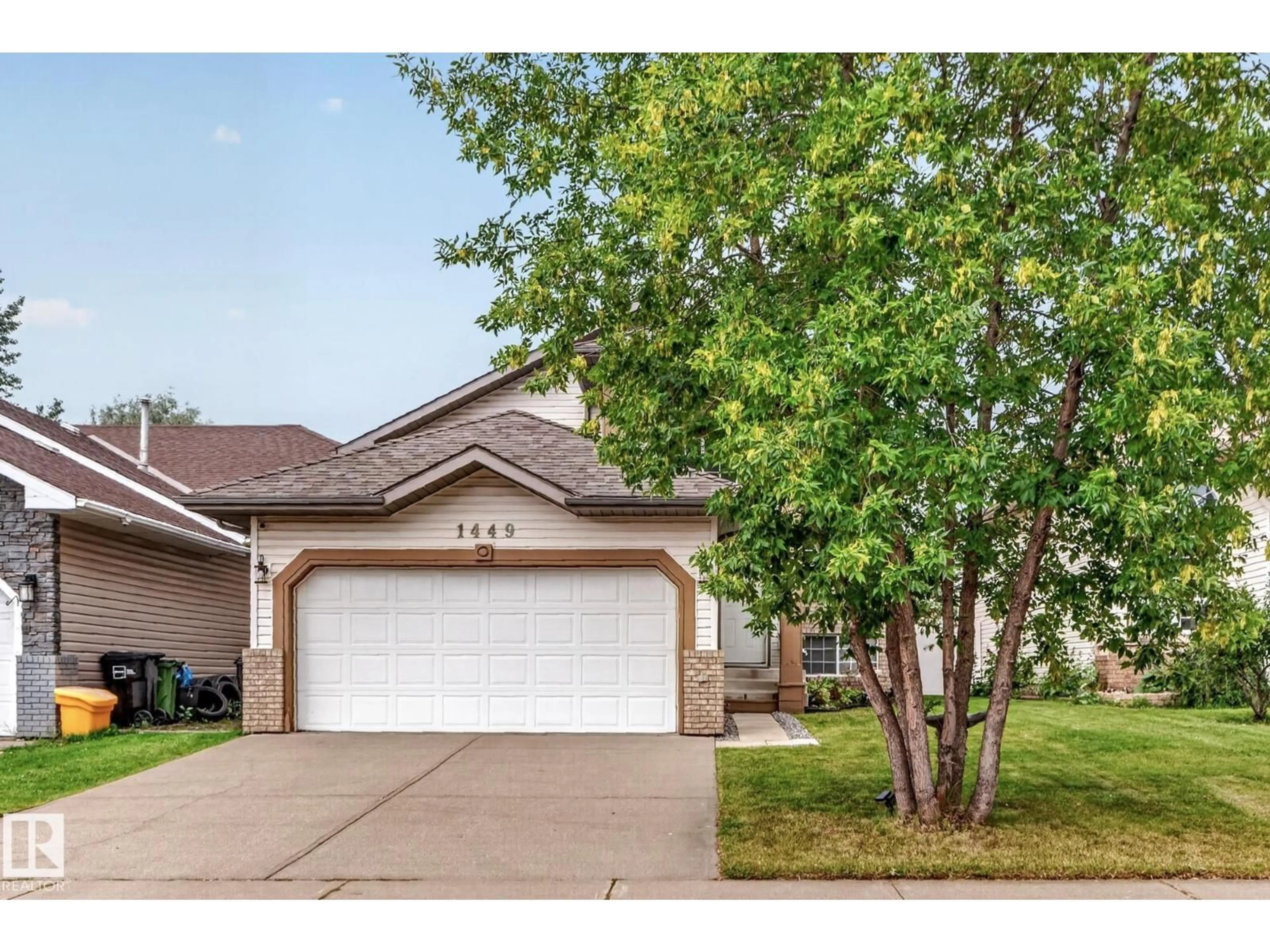 Home with vinyl exterior material, street for 1449 JEFFERYS CR, Edmonton Alberta T6L6T3