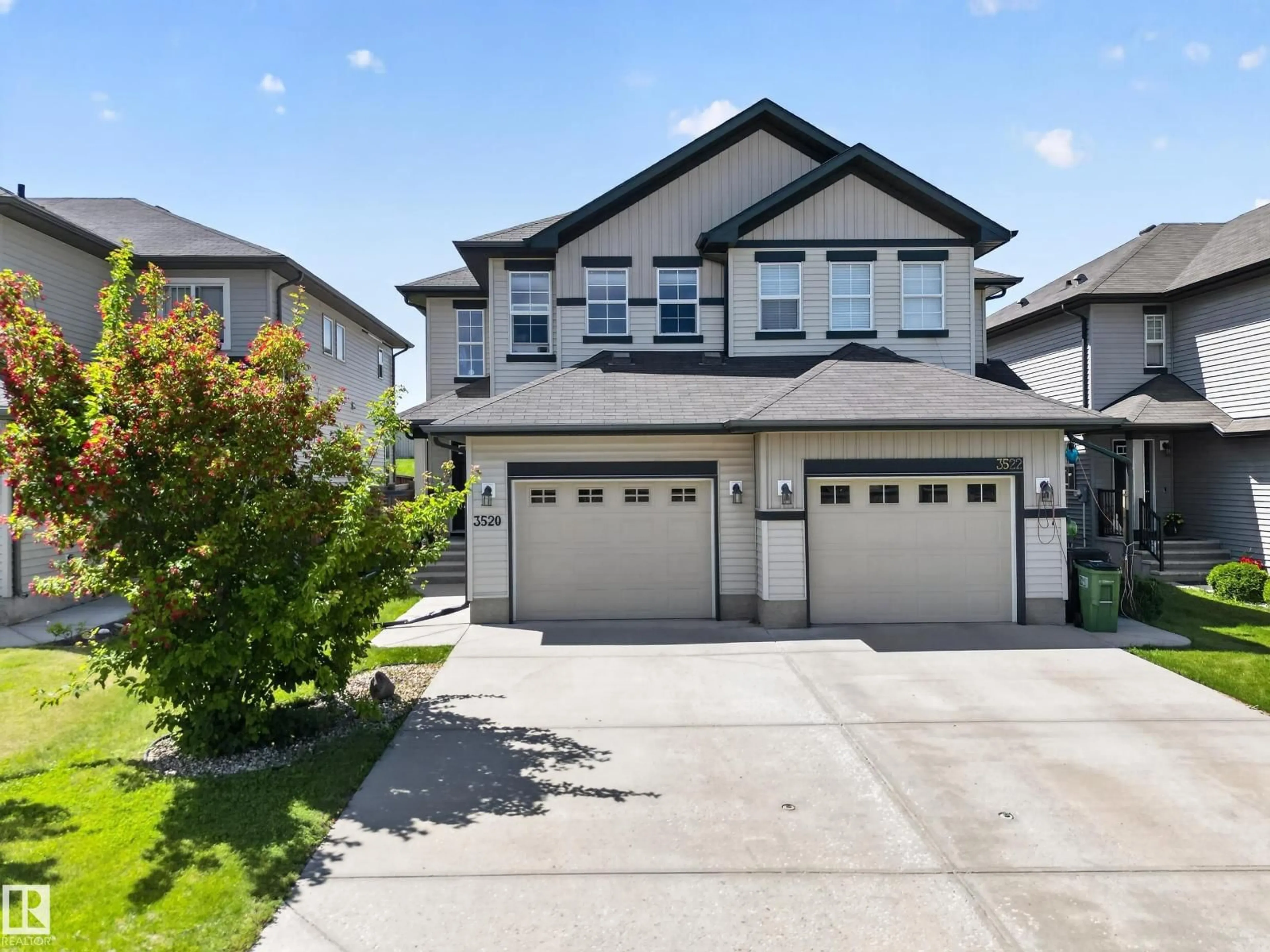 Home with vinyl exterior material, street for 3520 9 ST, Edmonton Alberta T6T1A2