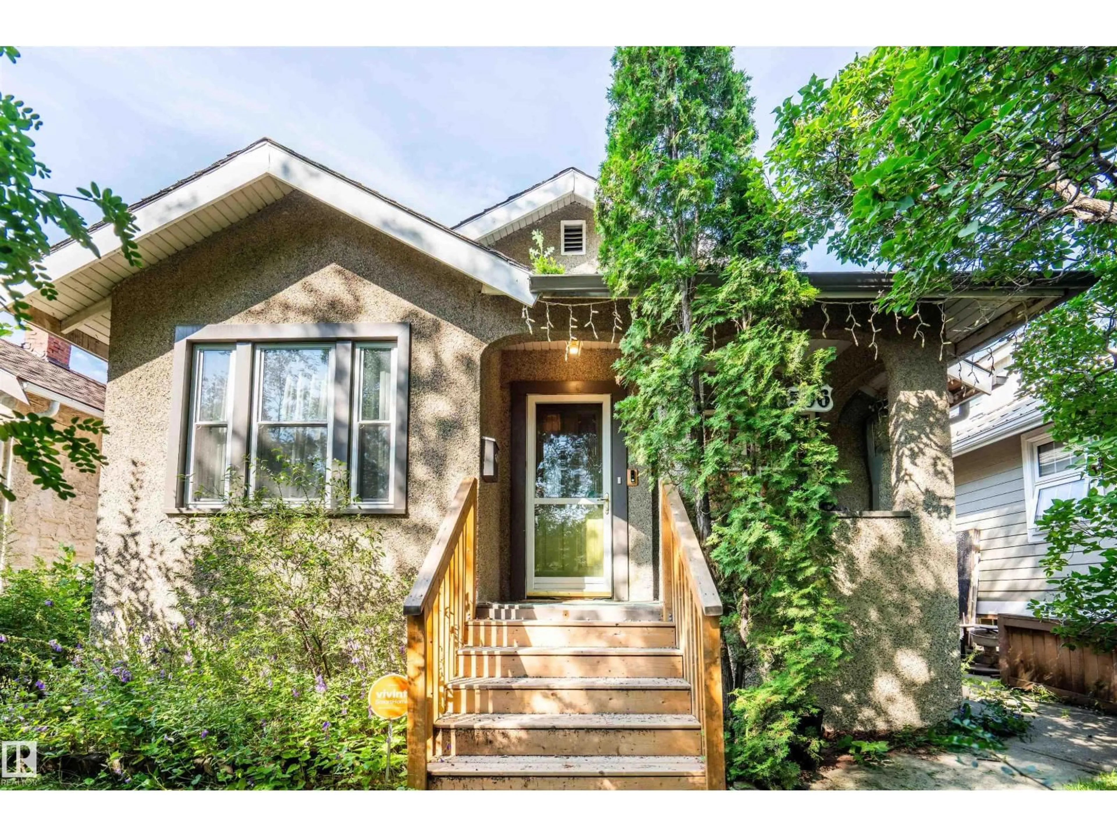 Home with vinyl exterior material, street for 11506 94 ST, Edmonton Alberta T5G1H7