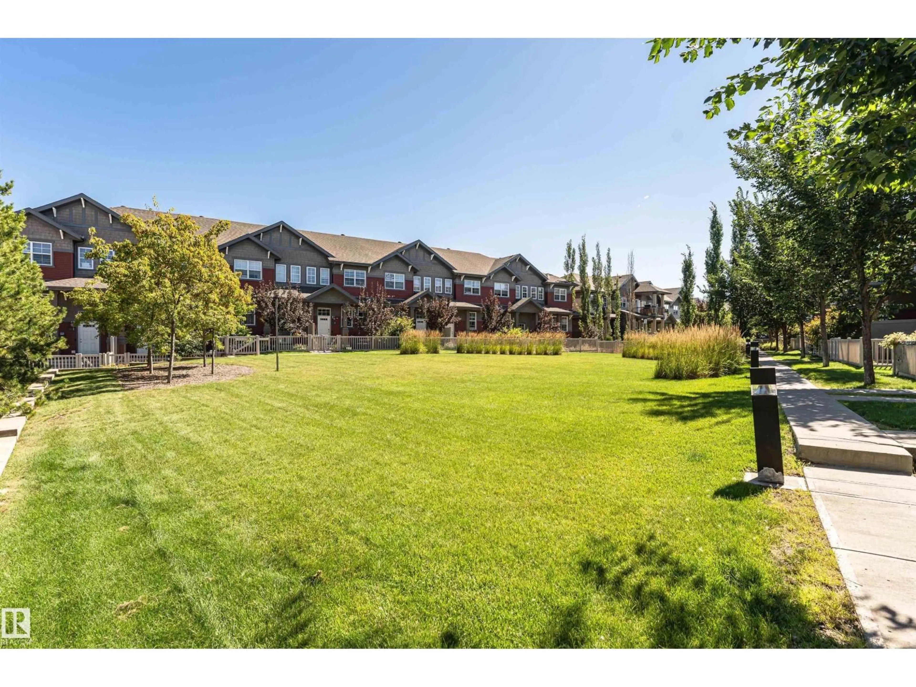 A pic from outside/outdoor area/front of a property/back of a property/a pic from drone, mountain view for #22 - 4029 ORCHARDS DR, Edmonton Alberta T6X1V2