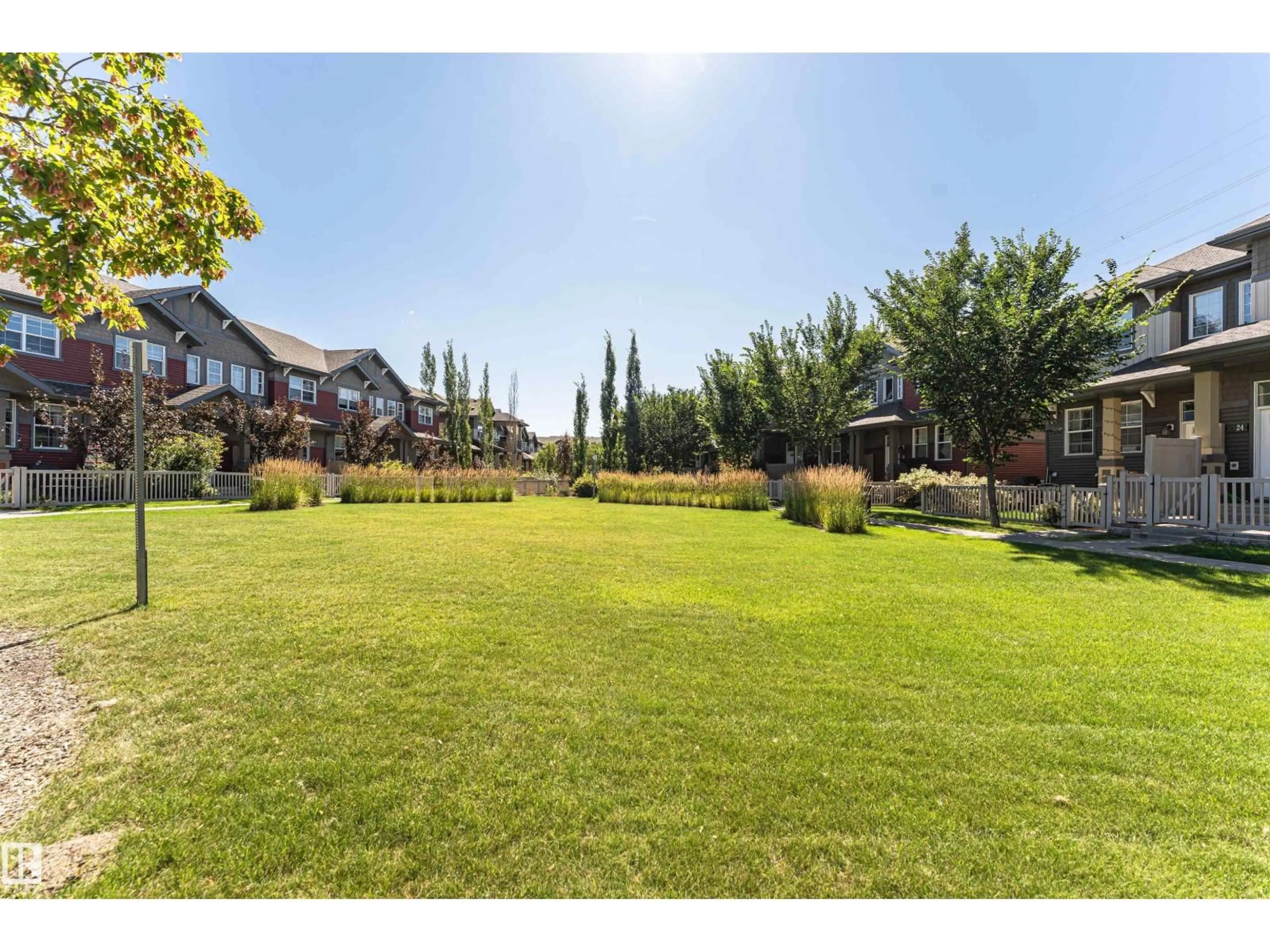 A pic from outside/outdoor area/front of a property/back of a property/a pic from drone, mountain view for #22 - 4029 ORCHARDS DR, Edmonton Alberta T6X1V2