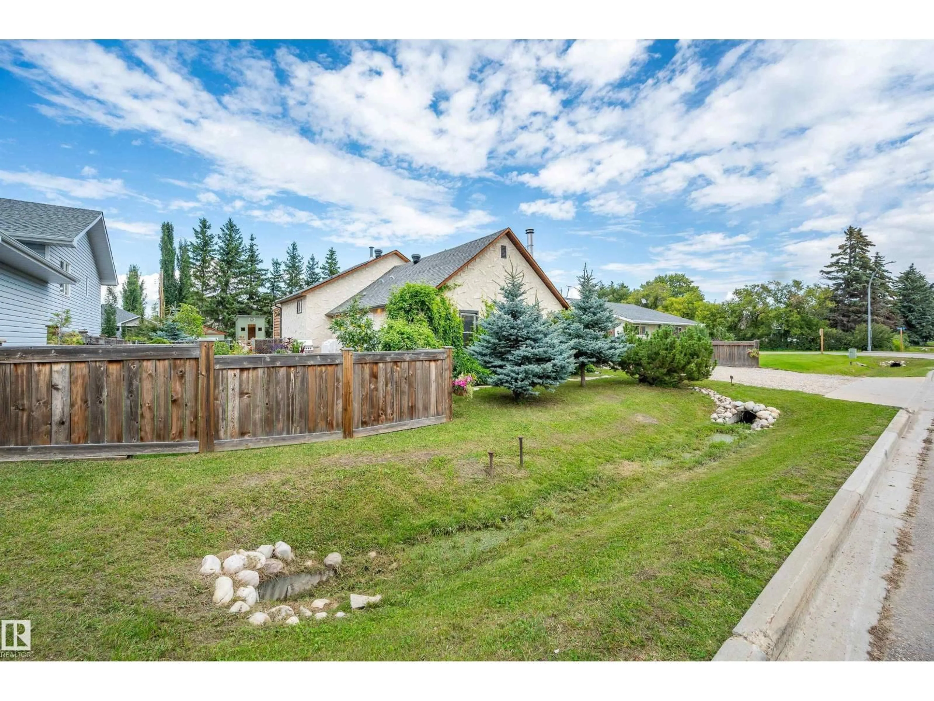 A pic from outside/outdoor area/front of a property/back of a property/a pic from drone, street for 312 - 25100 TWP ROAD 554, Cardiff Alberta T8R1P4