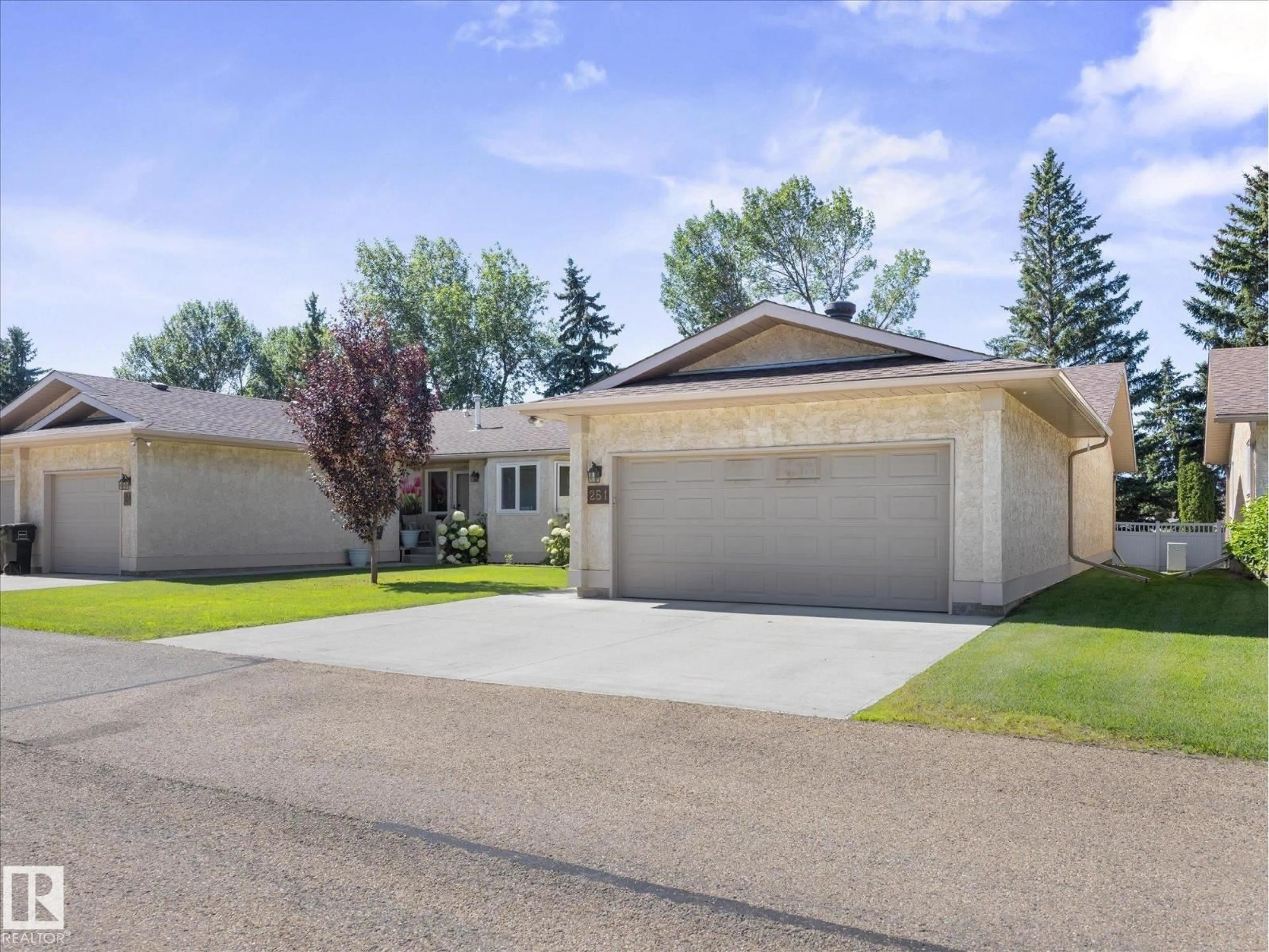 Home with vinyl exterior material, street for NW - 251 KNOTTWOOD RD N, Edmonton Alberta T6K4B9