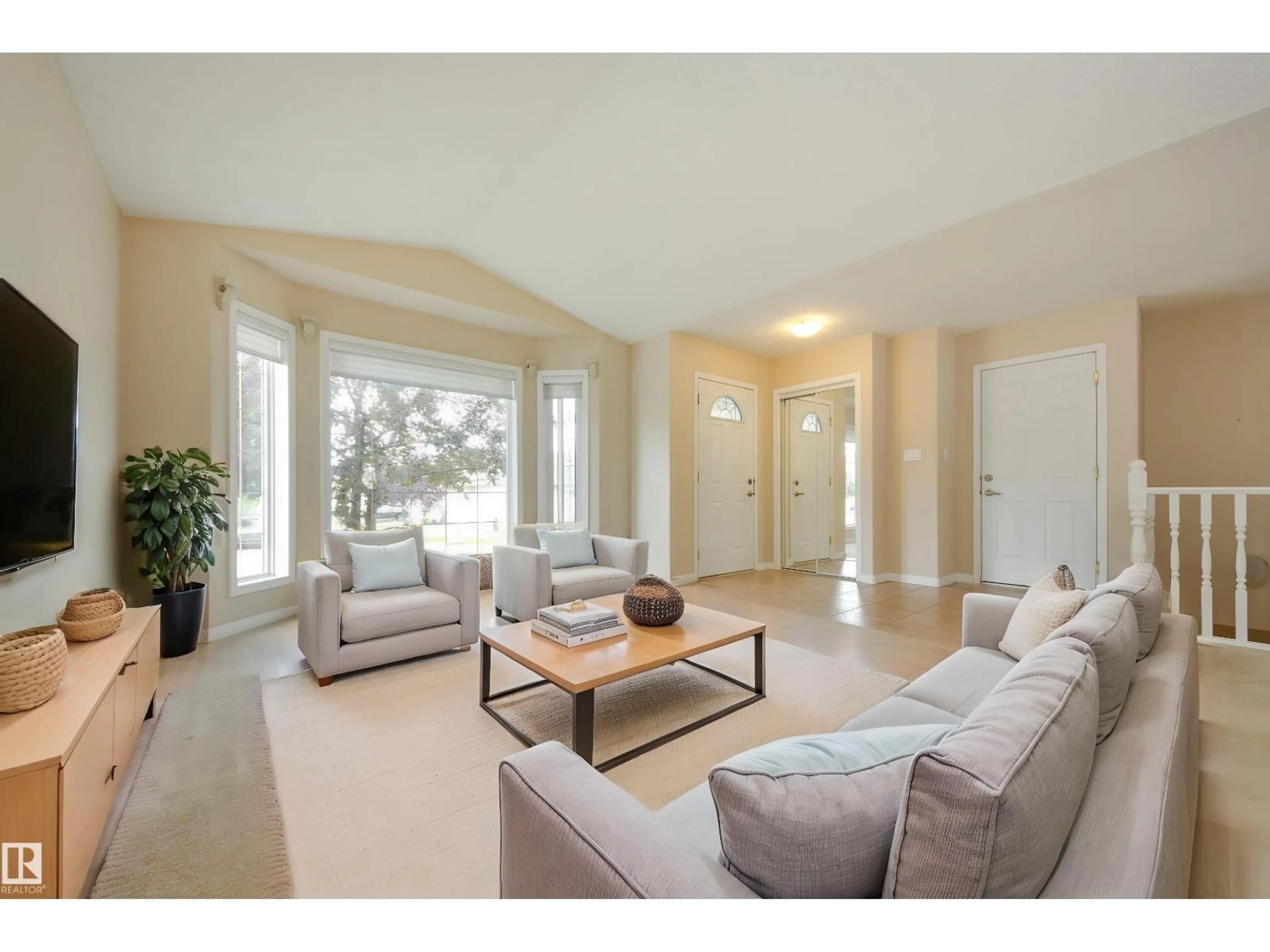 Living room with furniture, unknown for #2 - 1850 MILL WOODS RD E, Edmonton Alberta T6L7C6