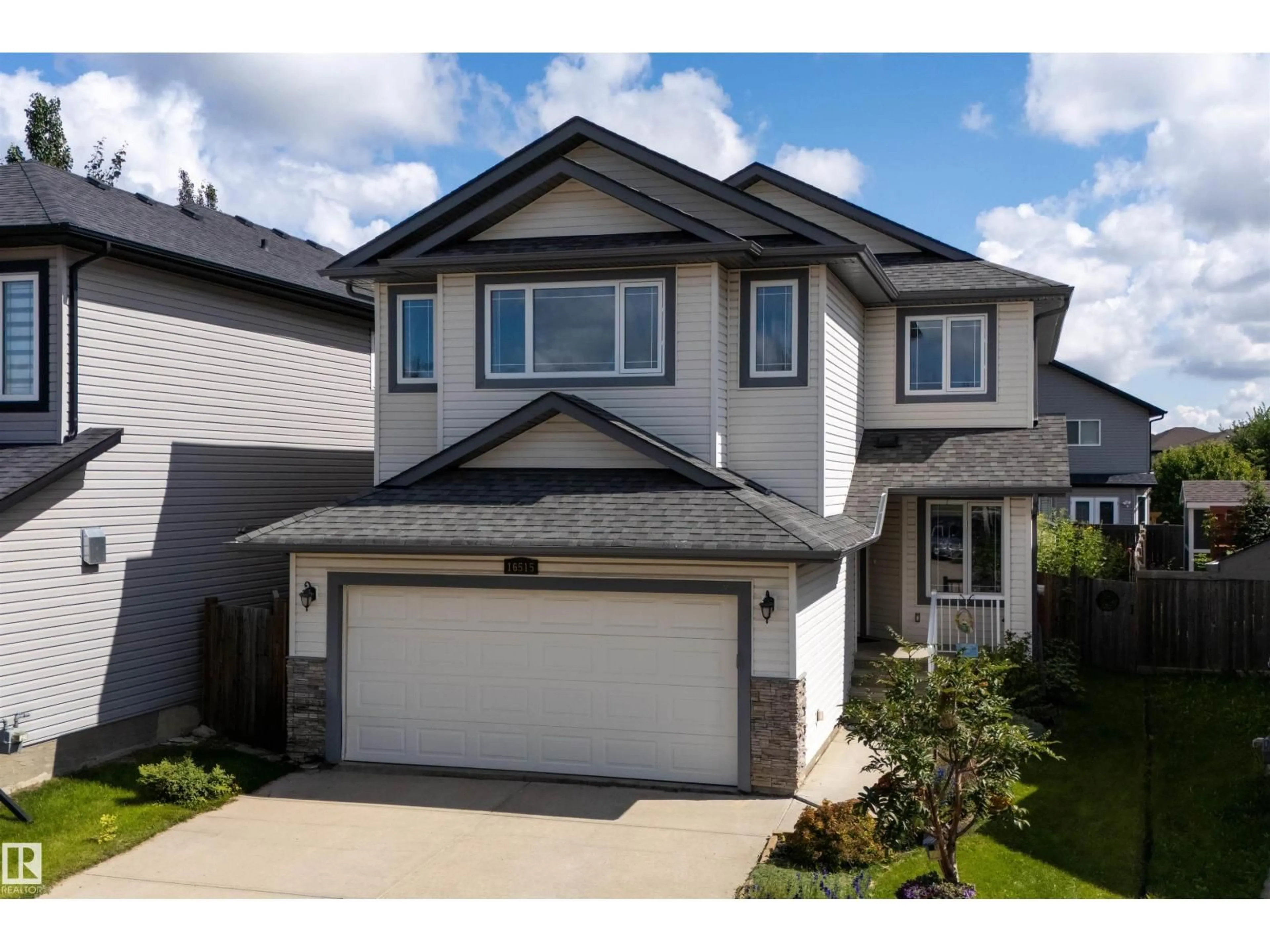 Home with vinyl exterior material, street for NW - 16515 139 ST, Edmonton Alberta T6V0H4