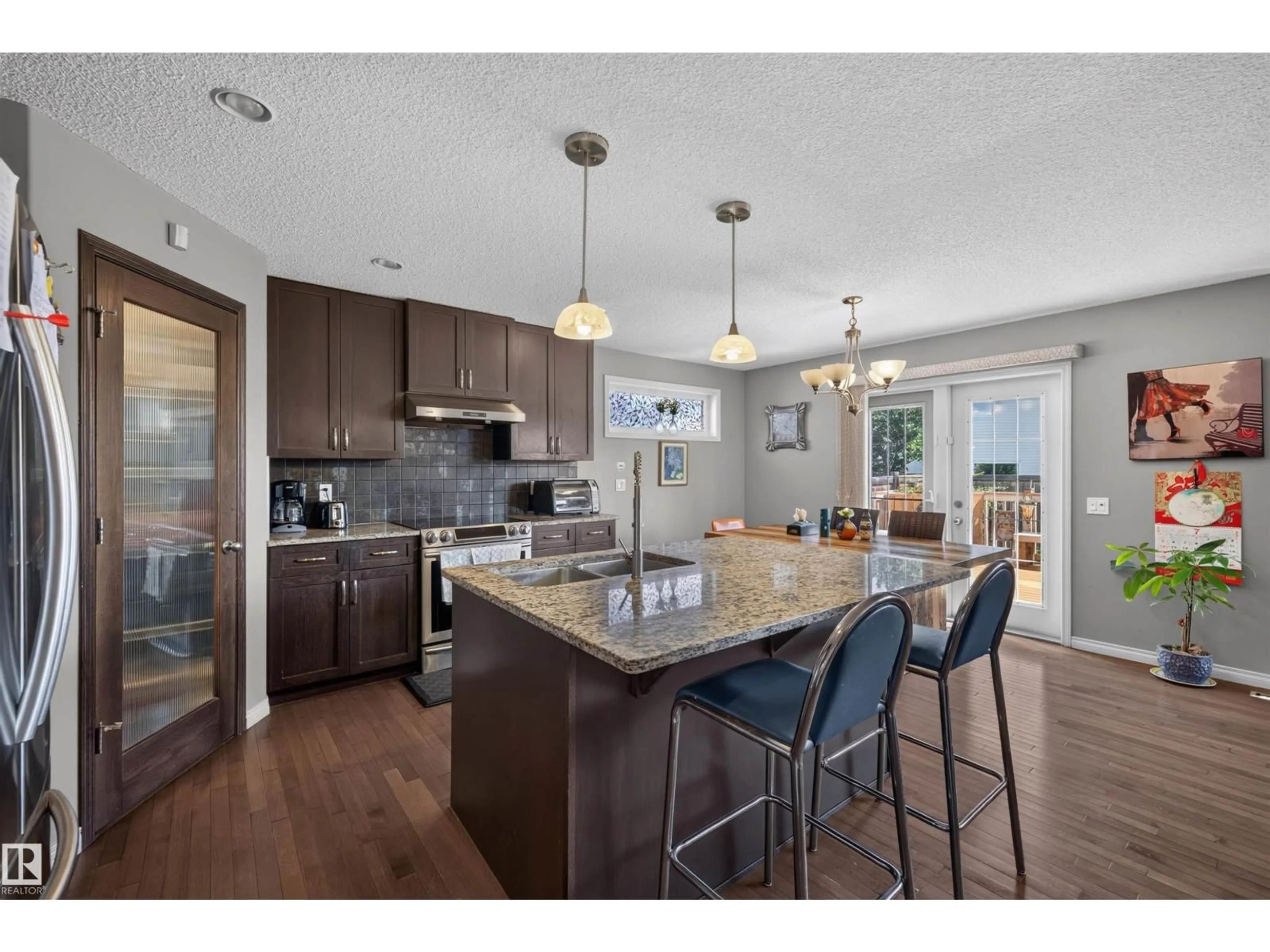 Open concept kitchen, unknown for NW - 16515 139 ST, Edmonton Alberta T6V0H4