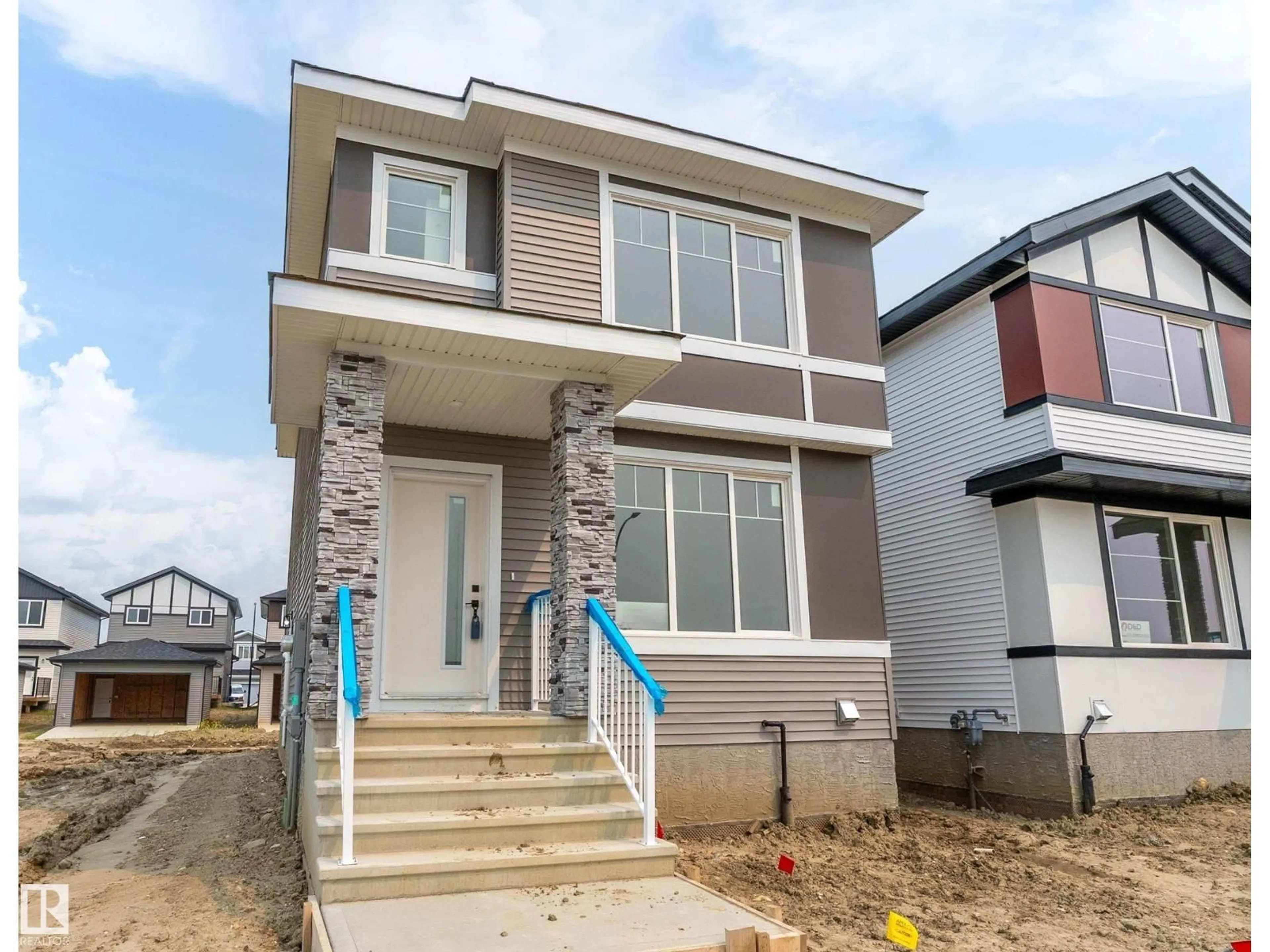 Home with vinyl exterior material, street for 523 ROBINSON BV, Leduc Alberta T9E1P8