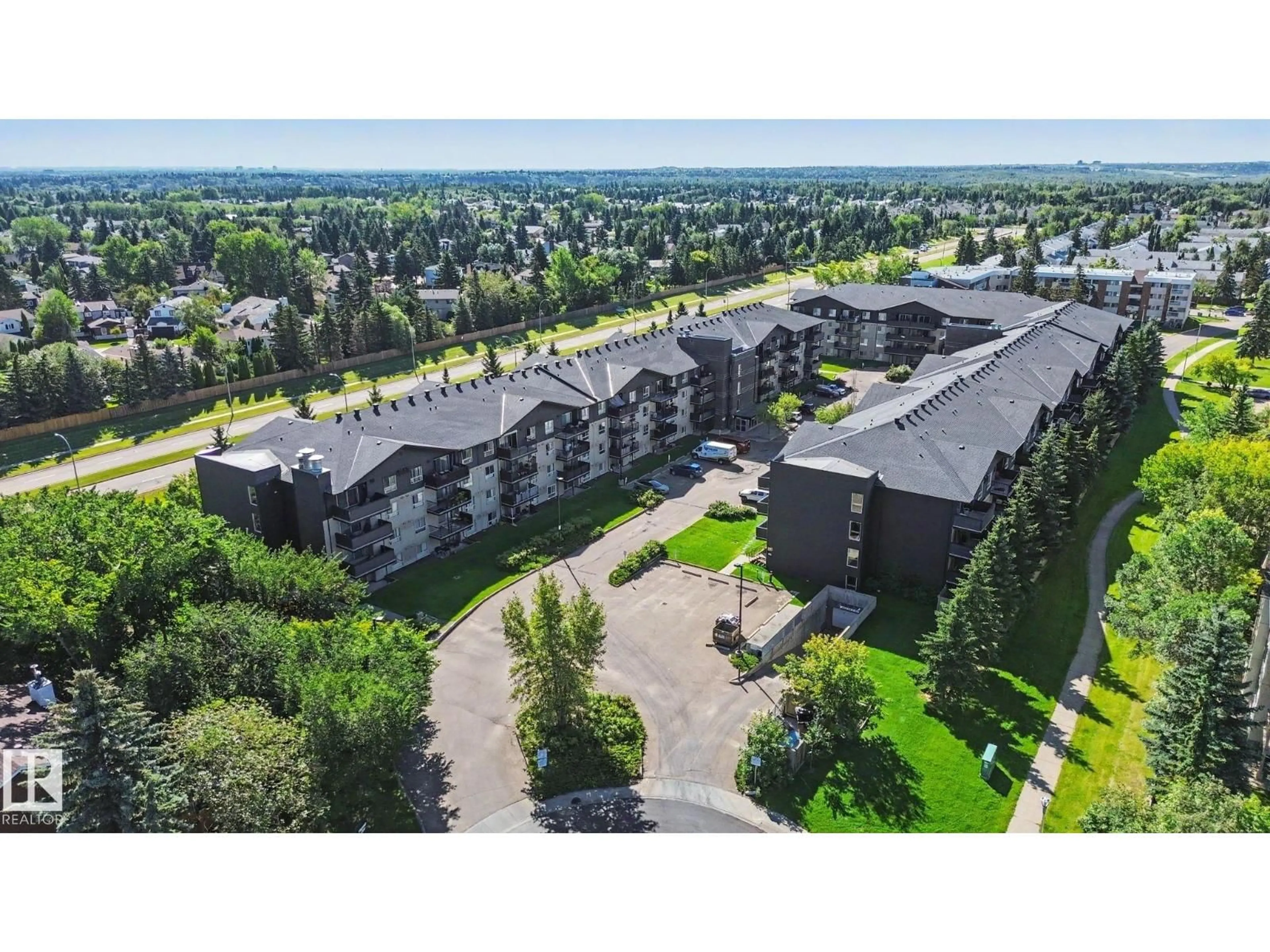 A pic from outside/outdoor area/front of a property/back of a property/a pic from drone, unknown for 226 17011 67 AV NW, Edmonton Alberta T5T6Y6
