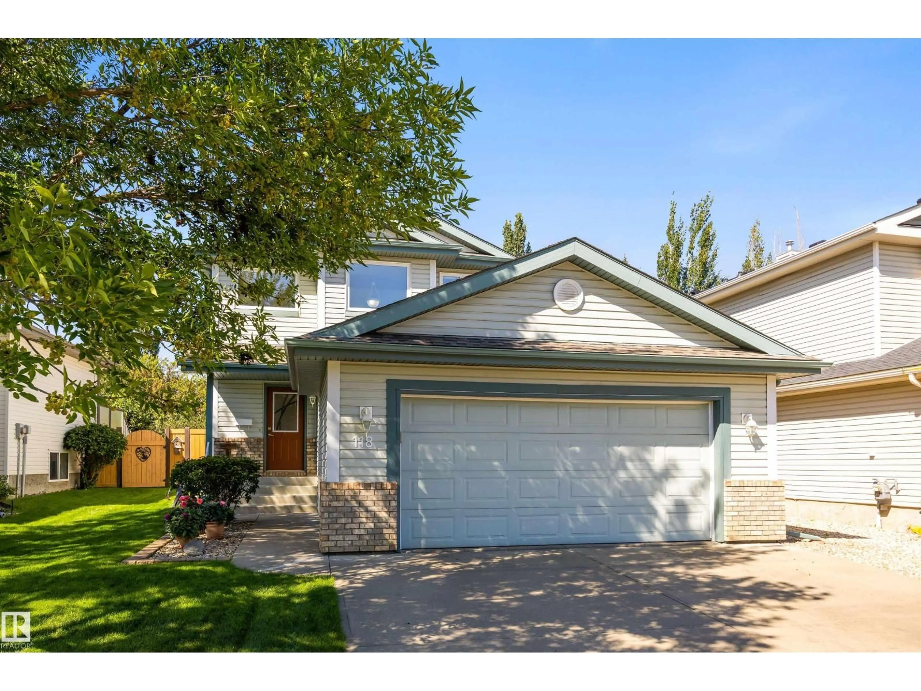 Home with vinyl exterior material, street for 118 NAPLES WY, St. Albert Alberta T8N7E4