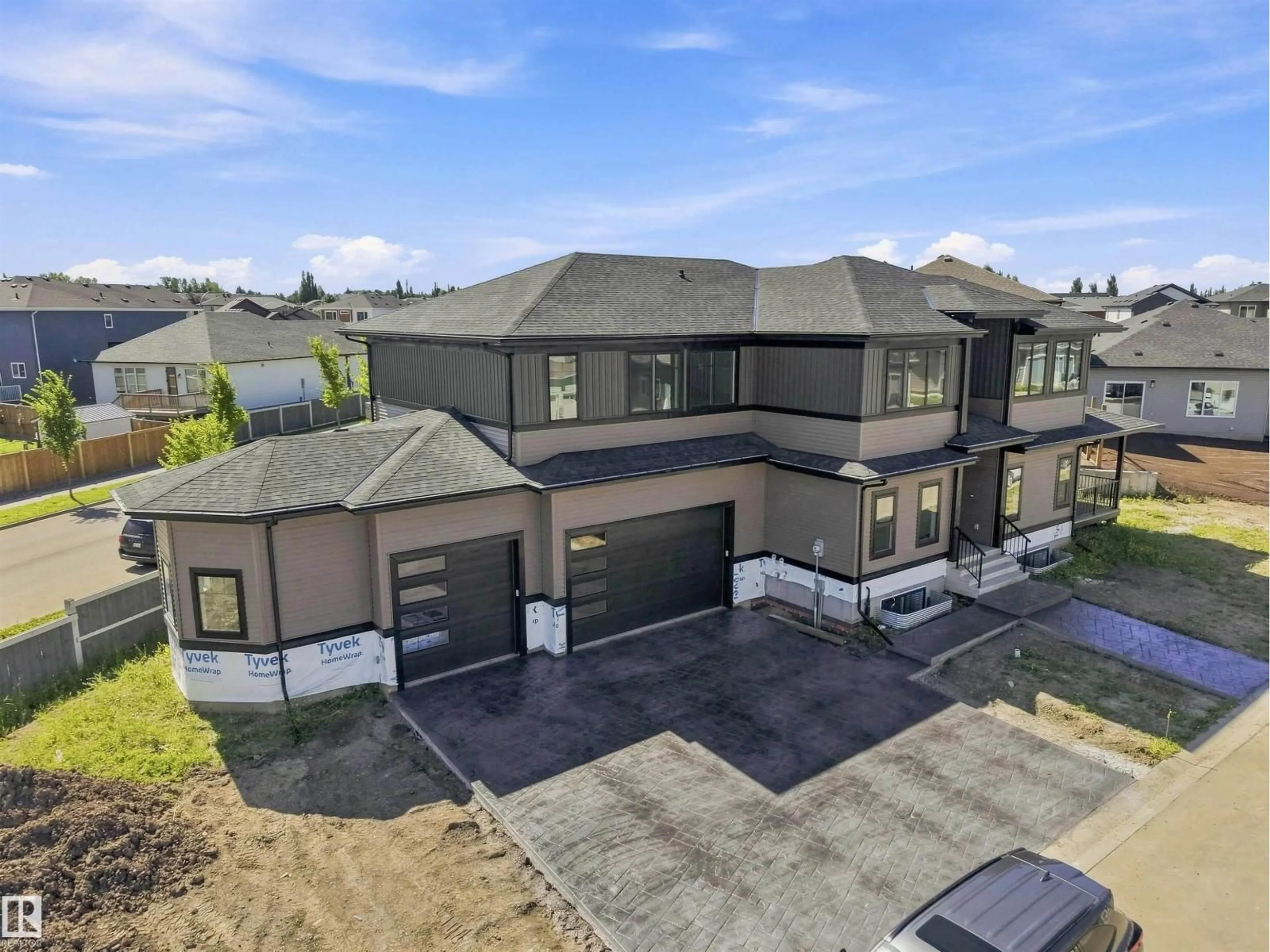 A pic from outside/outdoor area/front of a property/back of a property/a pic from drone, street for 33 HARLEY WY, Spruce Grove Alberta T7X0X4
