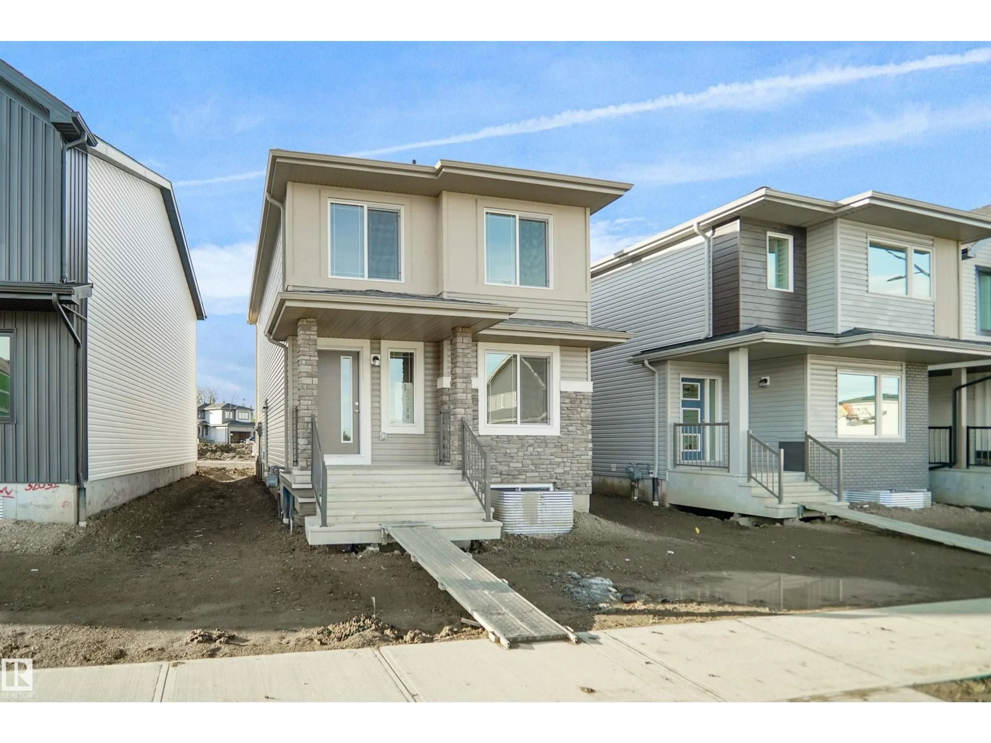 Home with vinyl exterior material, street for 251 FALCON CR, Leduc Alberta T0B3M3