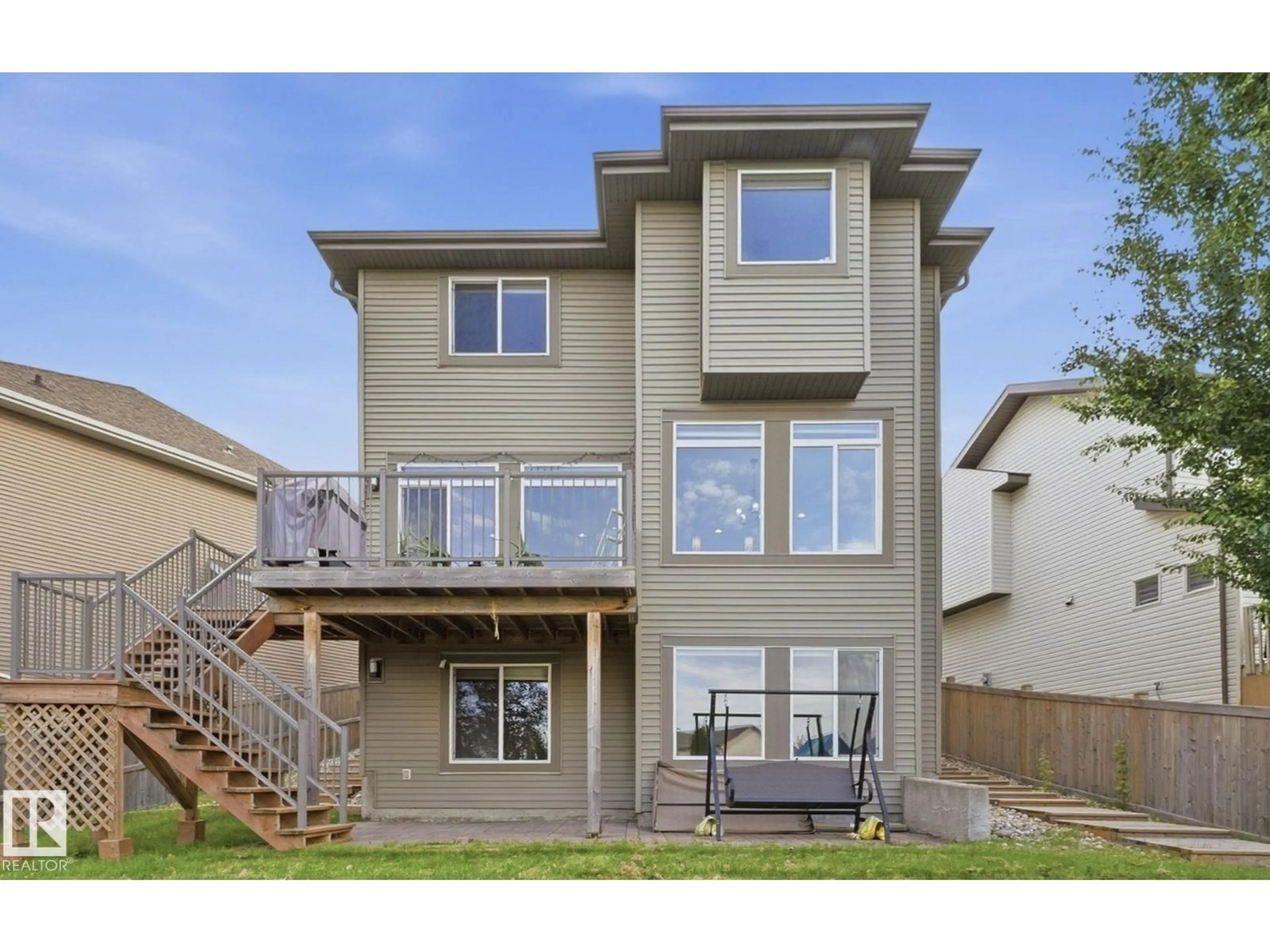 Home with vinyl exterior material, street for SW - 1832 56 ST, Edmonton Alberta T6X1T6