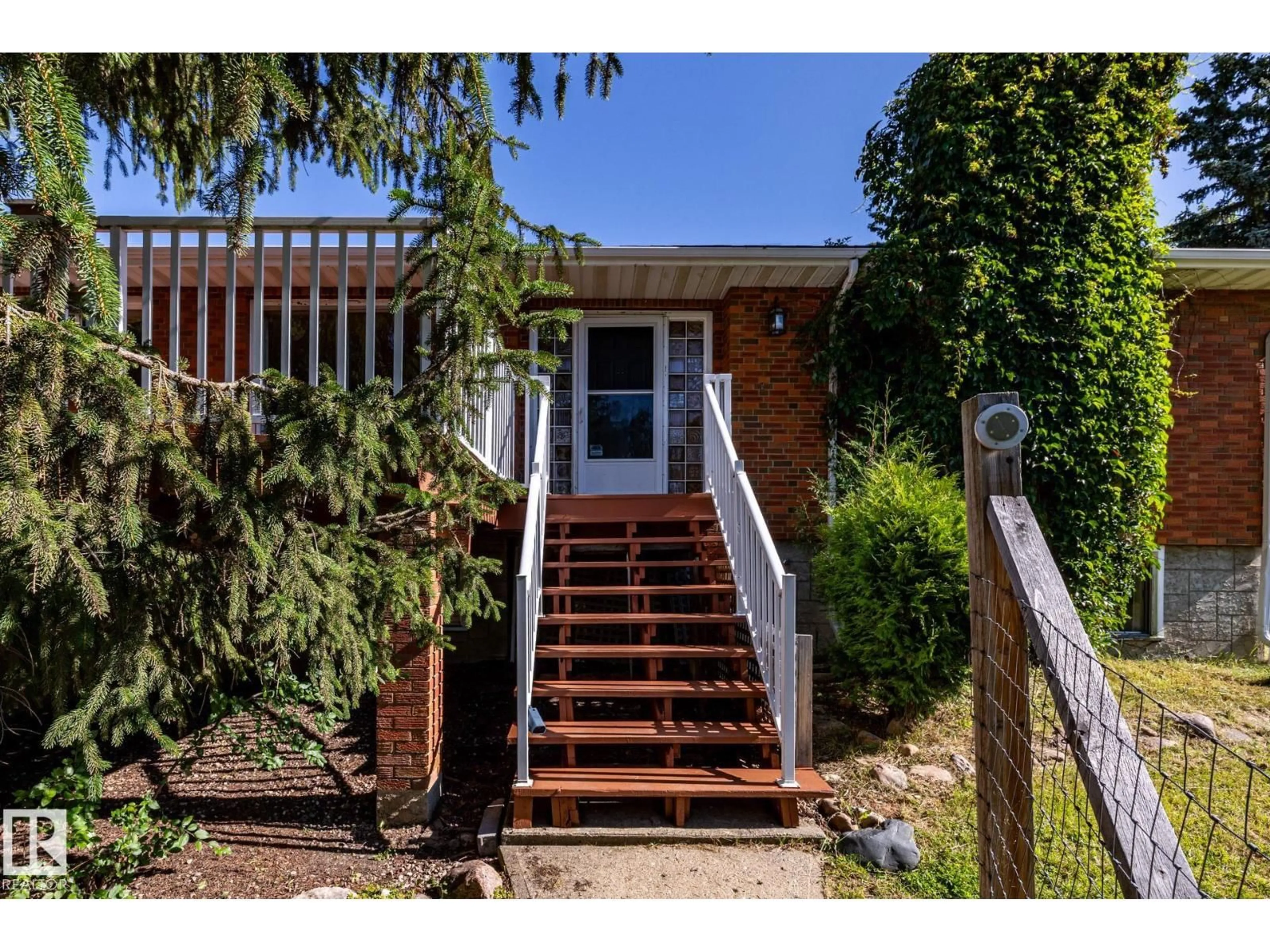 Home with brick exterior material, street for 22051 - 86 TWP ROAD 530 ROAD, Rural Strathcona County Alberta T8E2C4