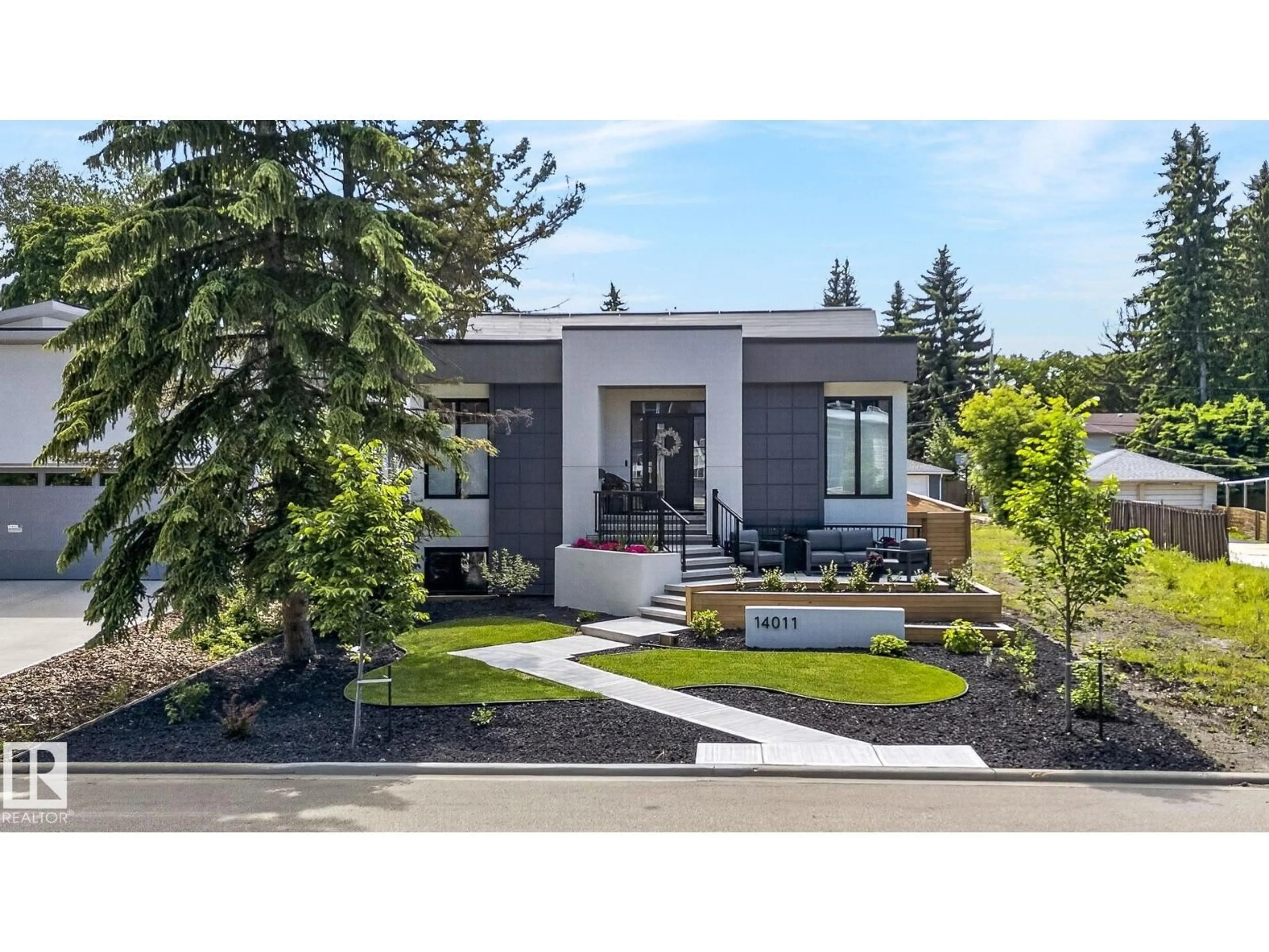 Home with vinyl exterior material, street for 14011 101 AV, Edmonton Alberta T5N0K2