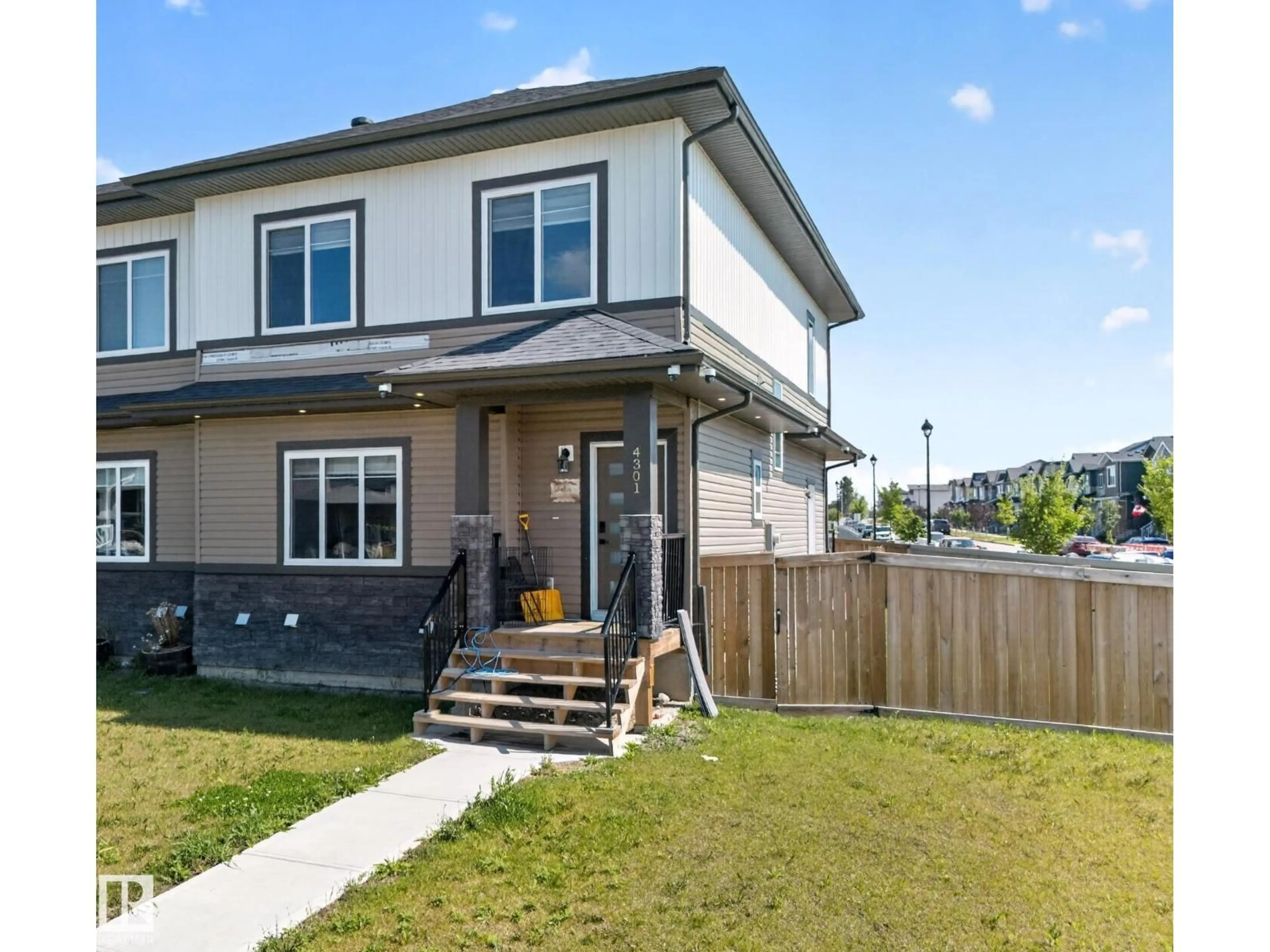 Home with vinyl exterior material, street for 4301 38 ST, Beaumont Alberta T4X2Y3