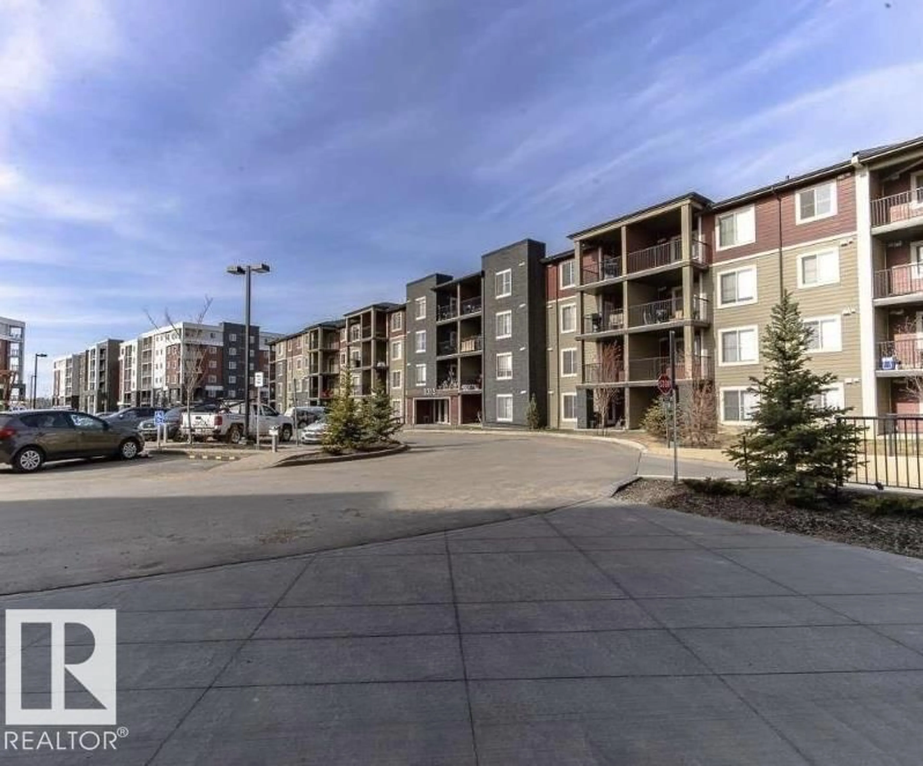 A pic from outside/outdoor area/front of a property/back of a property/a pic from drone, unknown for 421 - 3315 JAMES MOWATT TR, Edmonton Alberta T6W3L9