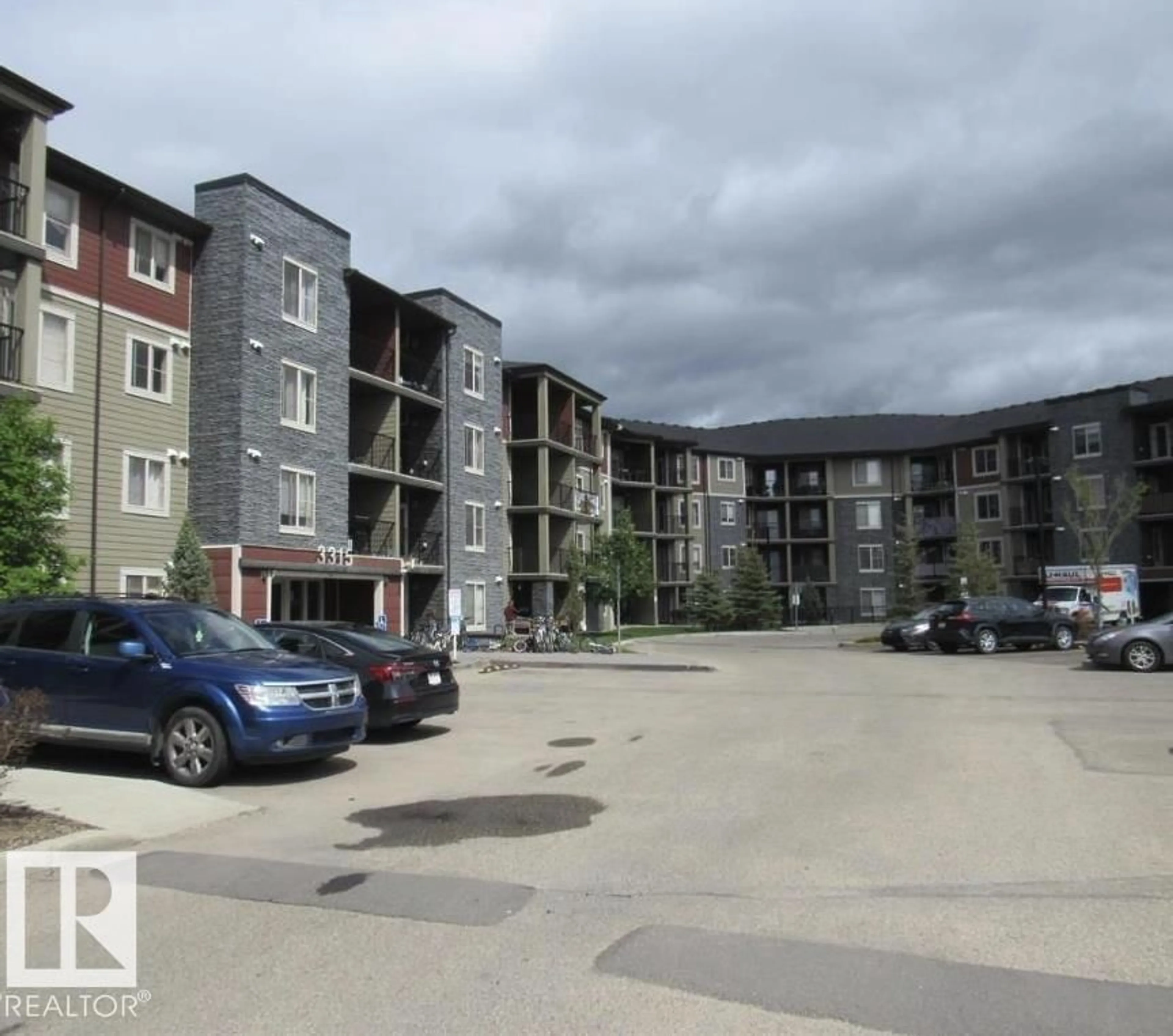A pic from outside/outdoor area/front of a property/back of a property/a pic from drone, unknown for 421 - 3315 JAMES MOWATT TR, Edmonton Alberta T6W3L9