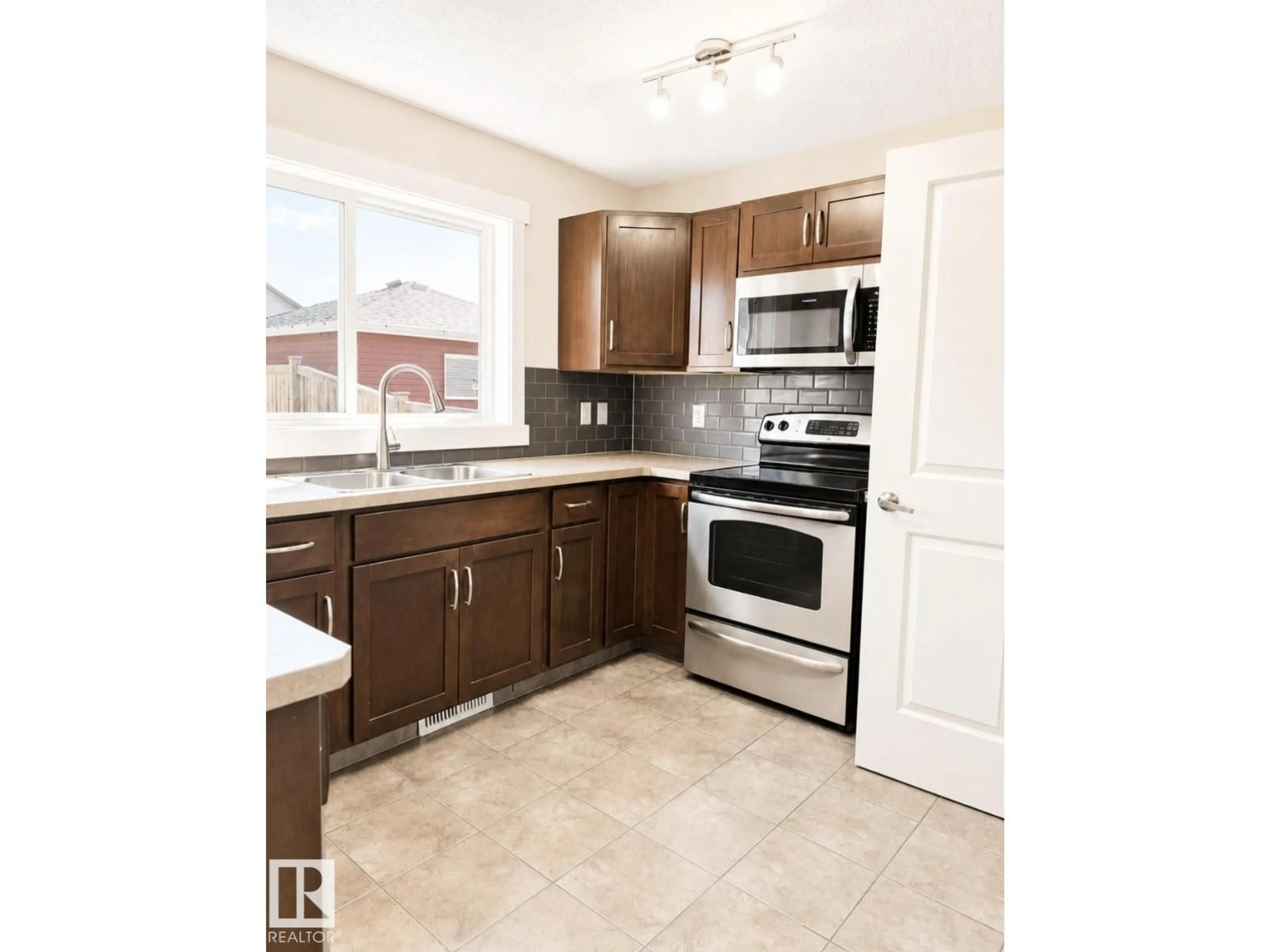 Standard kitchen, ceramic/tile floor for 5135 1A AV, Edmonton Alberta T6X0X3
