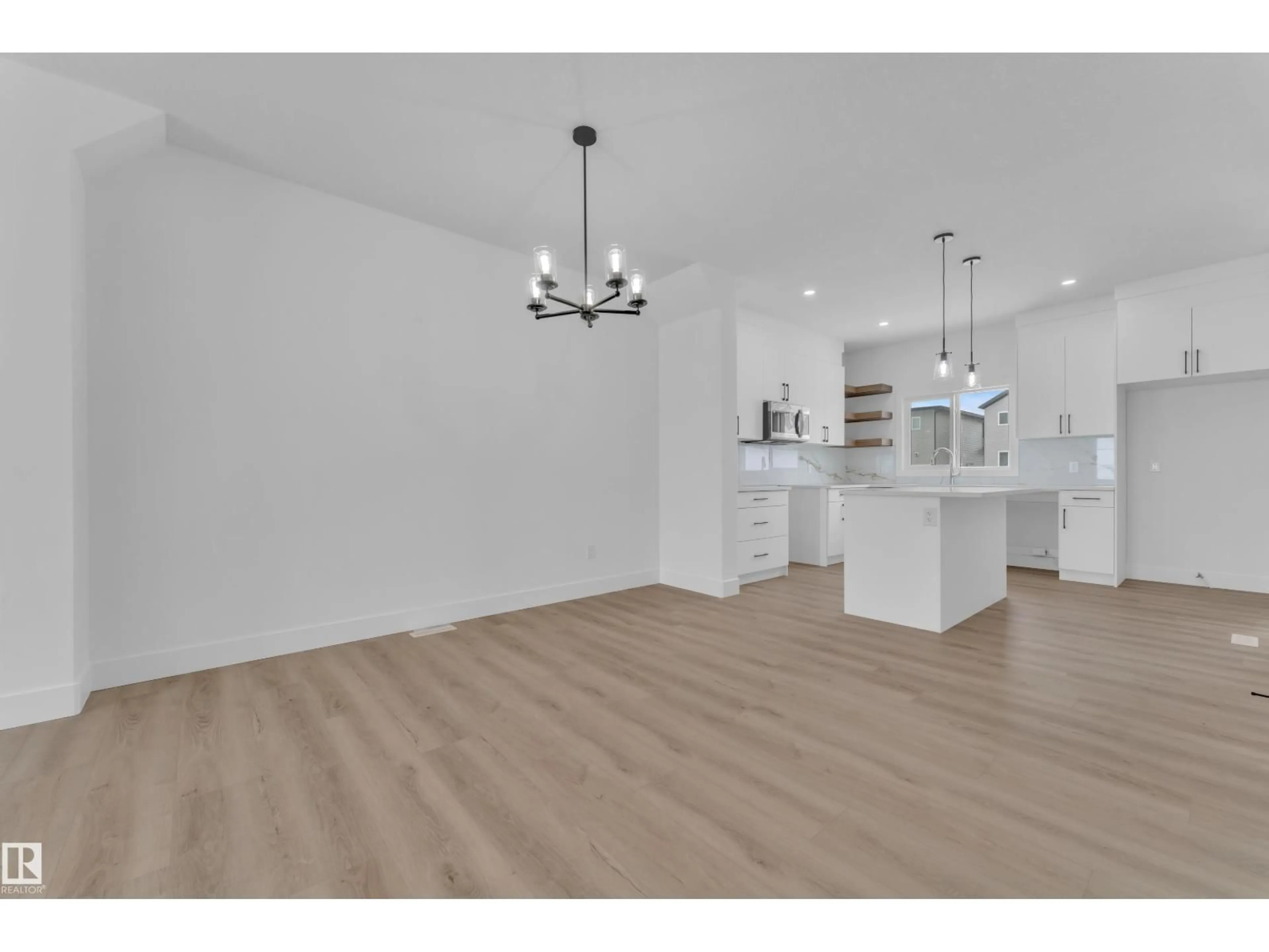Open concept kitchen, wood/laminate floor for 82 PATRIOT WY, Spruce Grove Alberta T7X4E8