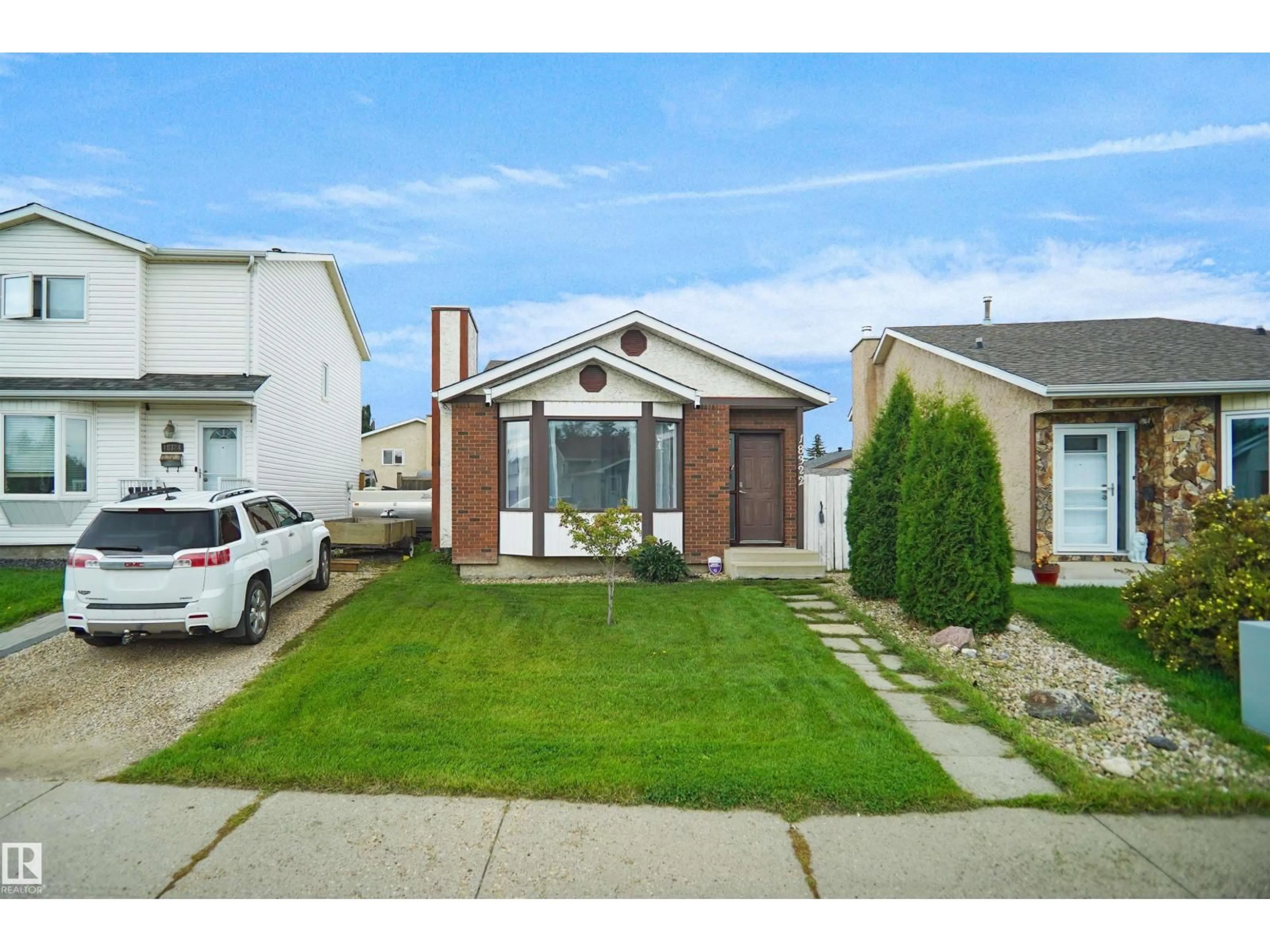 Home with vinyl exterior material, street for 18322 71A AV, Edmonton Alberta T5T3Z2