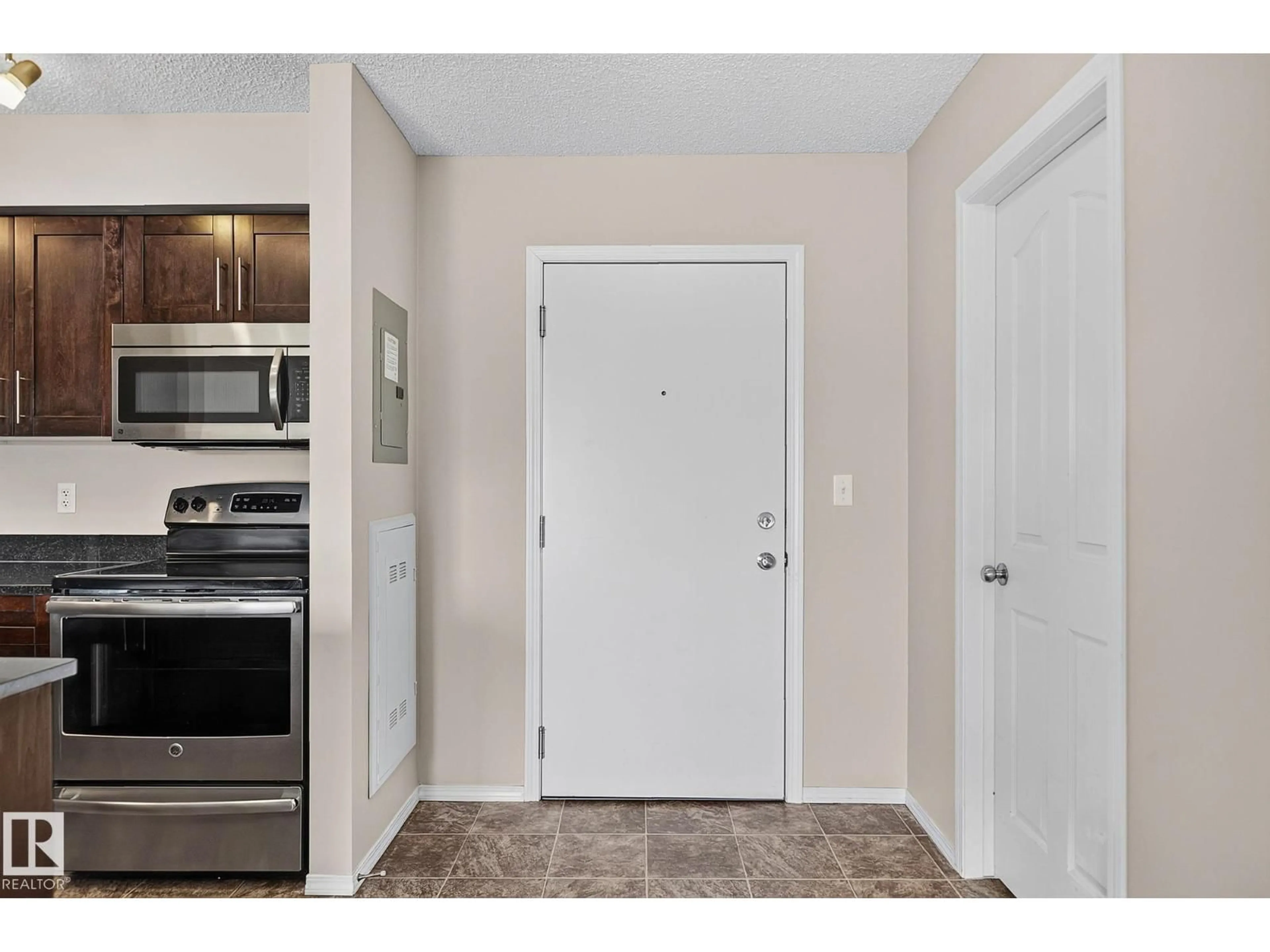 Indoor entryway for #417 - 12045 22 AV, Edmonton Alberta T6W2Y2