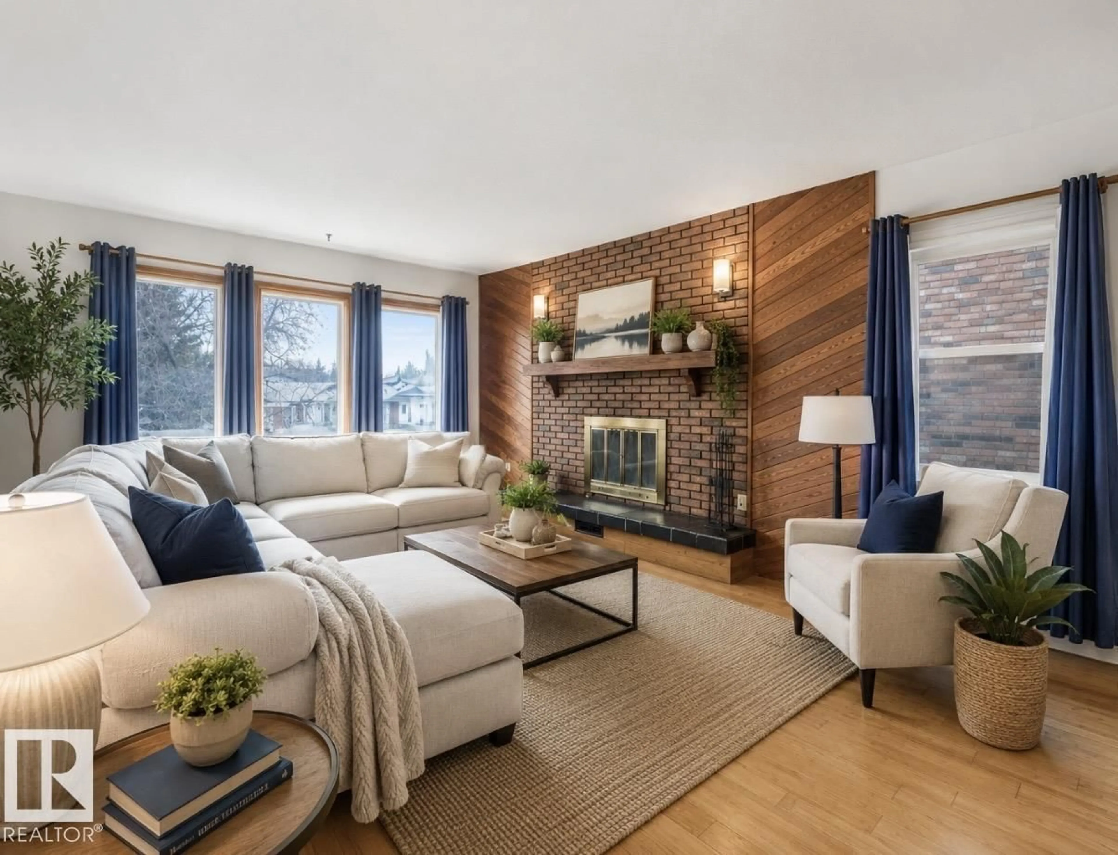 Living room with furniture, wood/laminate floor for NW - 4512 20A AV, Edmonton Alberta T6L2Z5