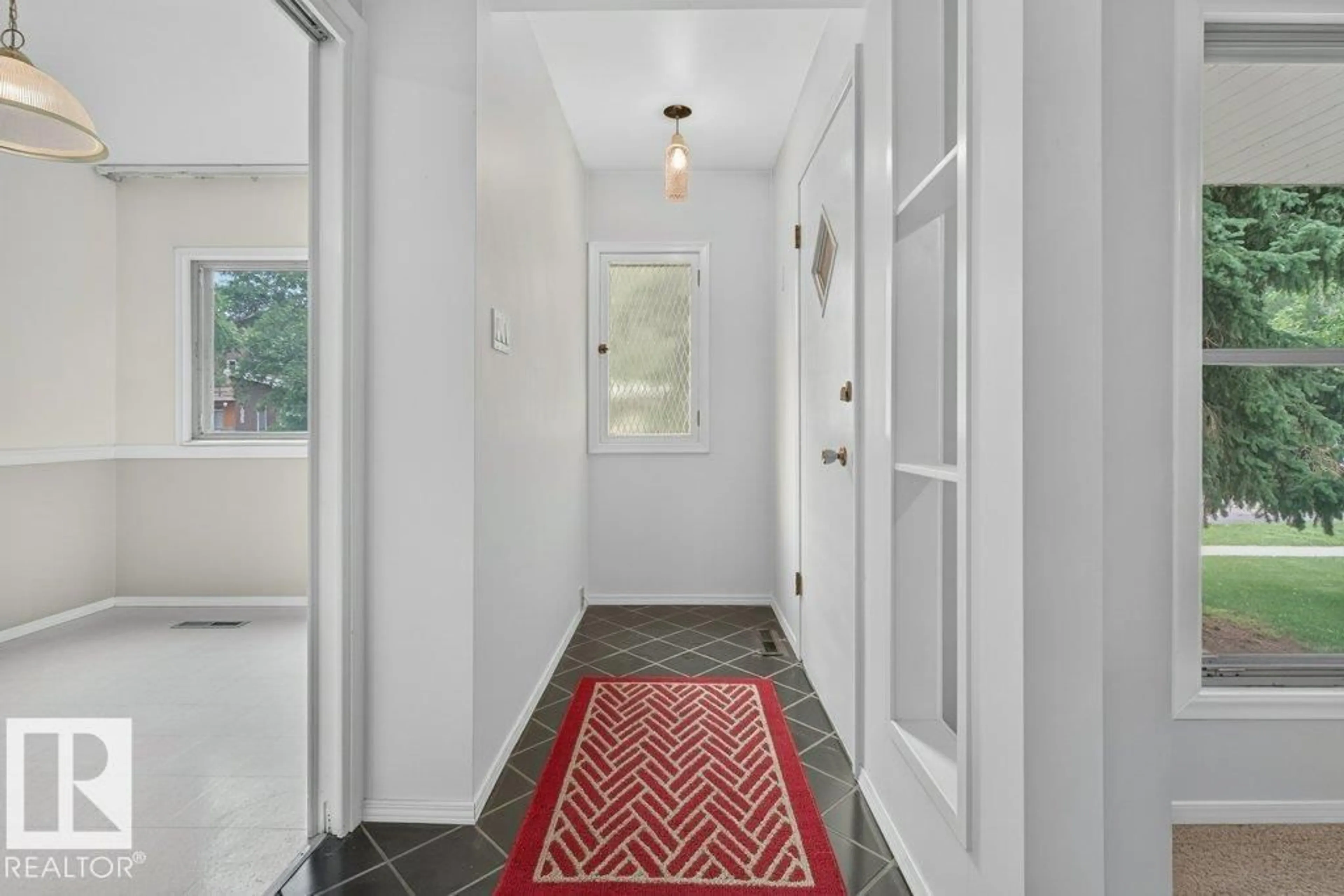 Indoor entryway for 9026 92 ST, Edmonton Alberta T6C3R2