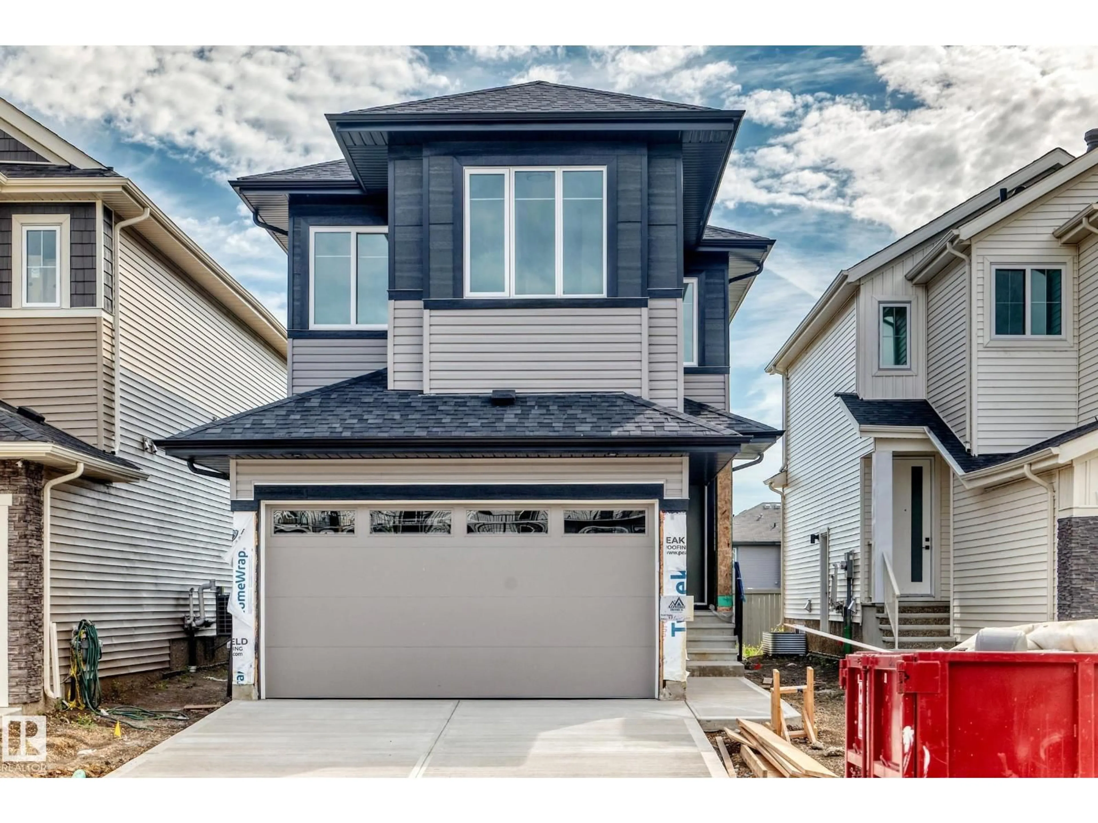 Home with vinyl exterior material, street for 77 ELLIOTT WD, Fort Saskatchewan Alberta T8L1R8