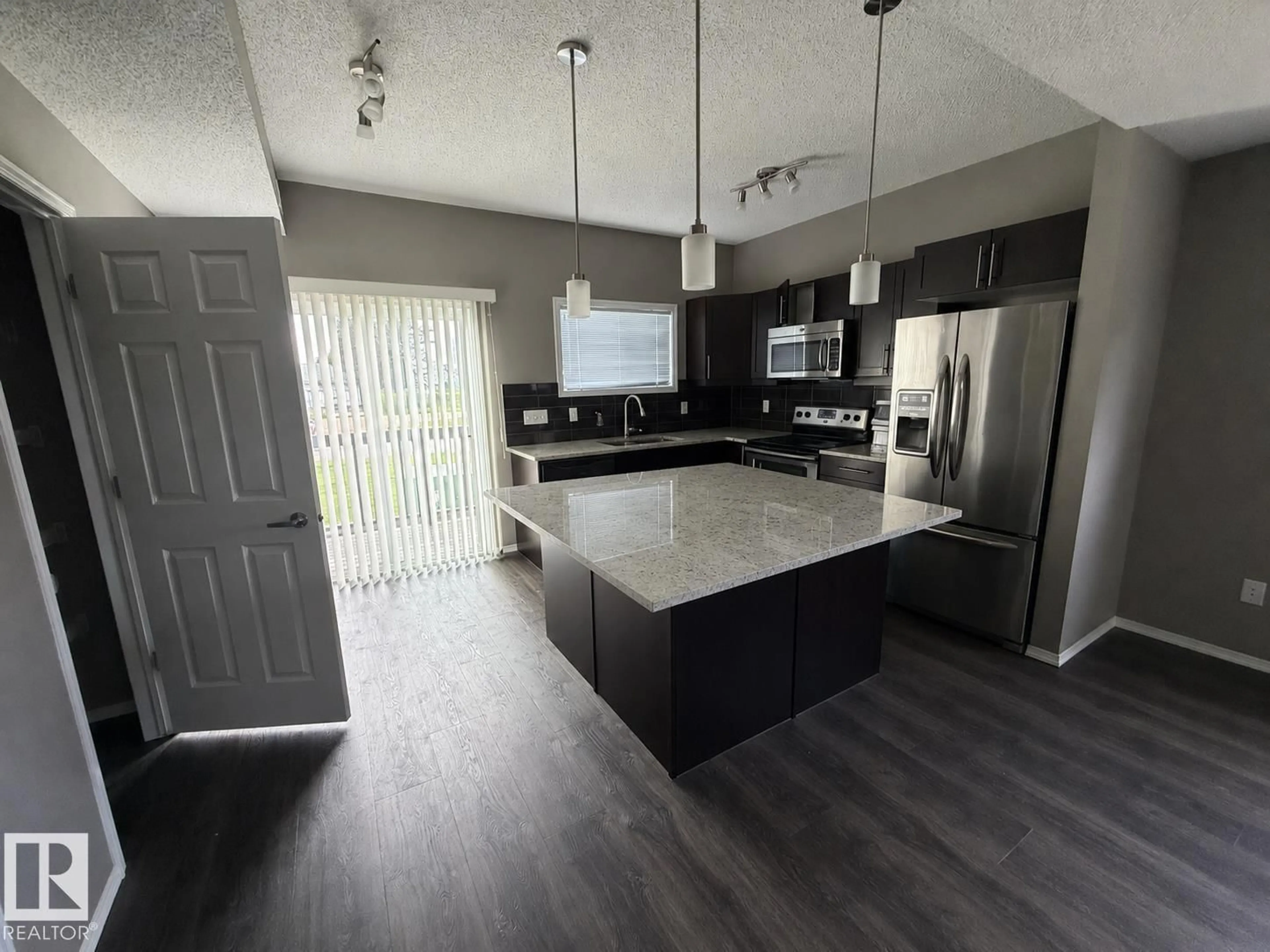 Open concept kitchen, unknown for 21 - 6520 2 AV SW, Edmonton Alberta T6X1S4