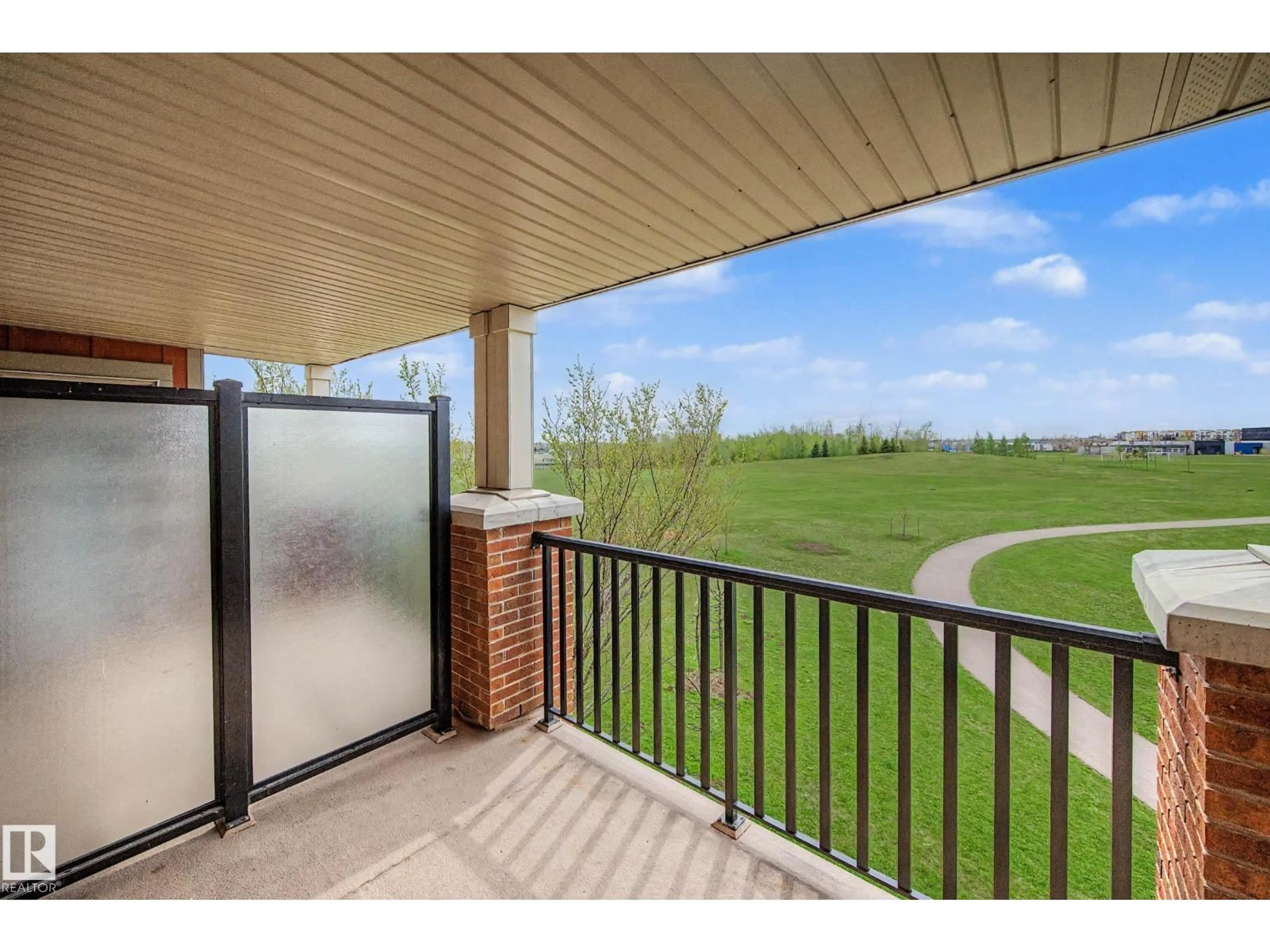 Patio, water/lake/river/ocean view for #311 - 3719 WHITELAW LN, Edmonton Alberta T6W2C3