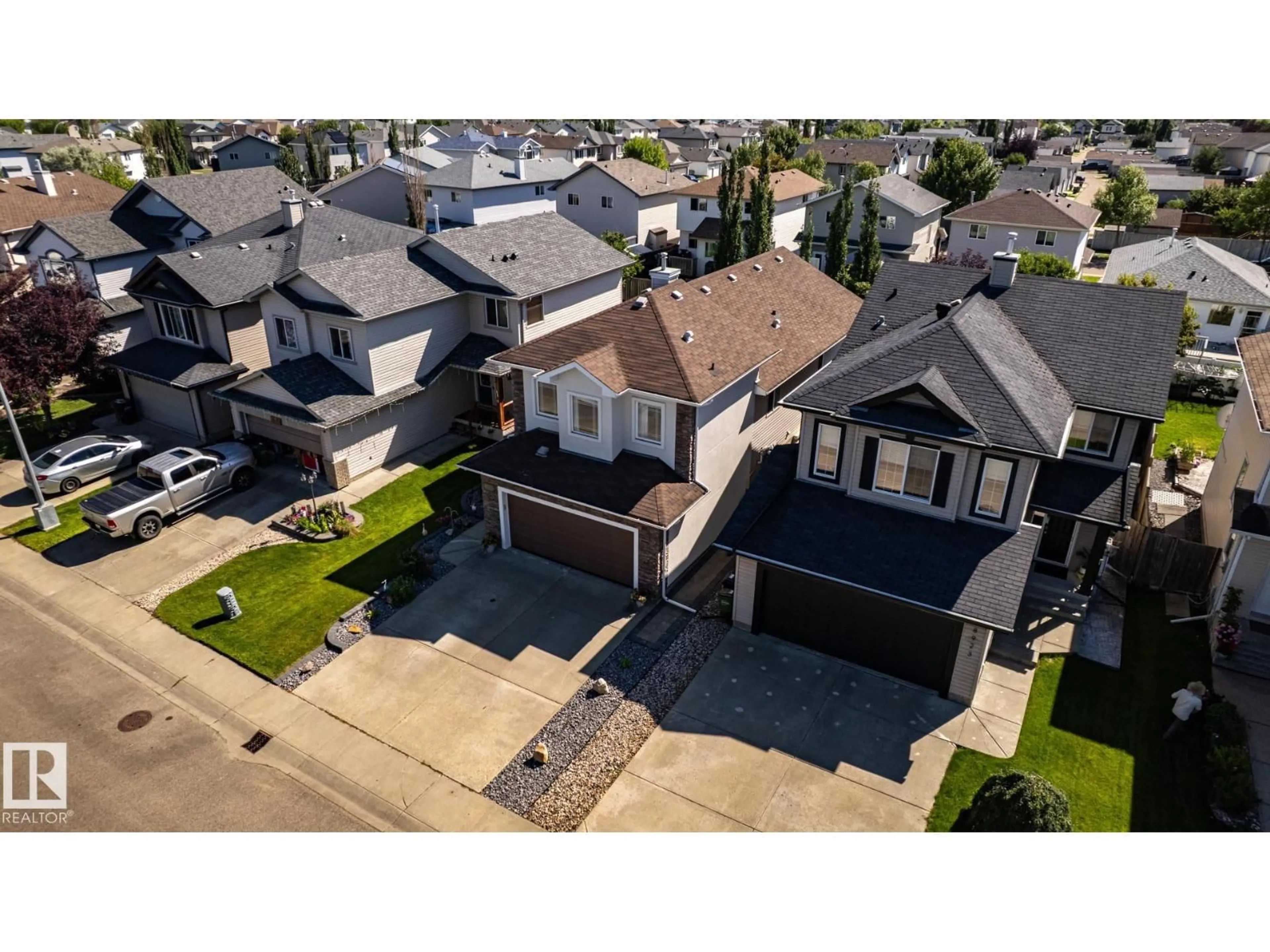 A pic from outside/outdoor area/front of a property/back of a property/a pic from drone, street for 8919 176 AV, Edmonton Alberta T5Z0A2