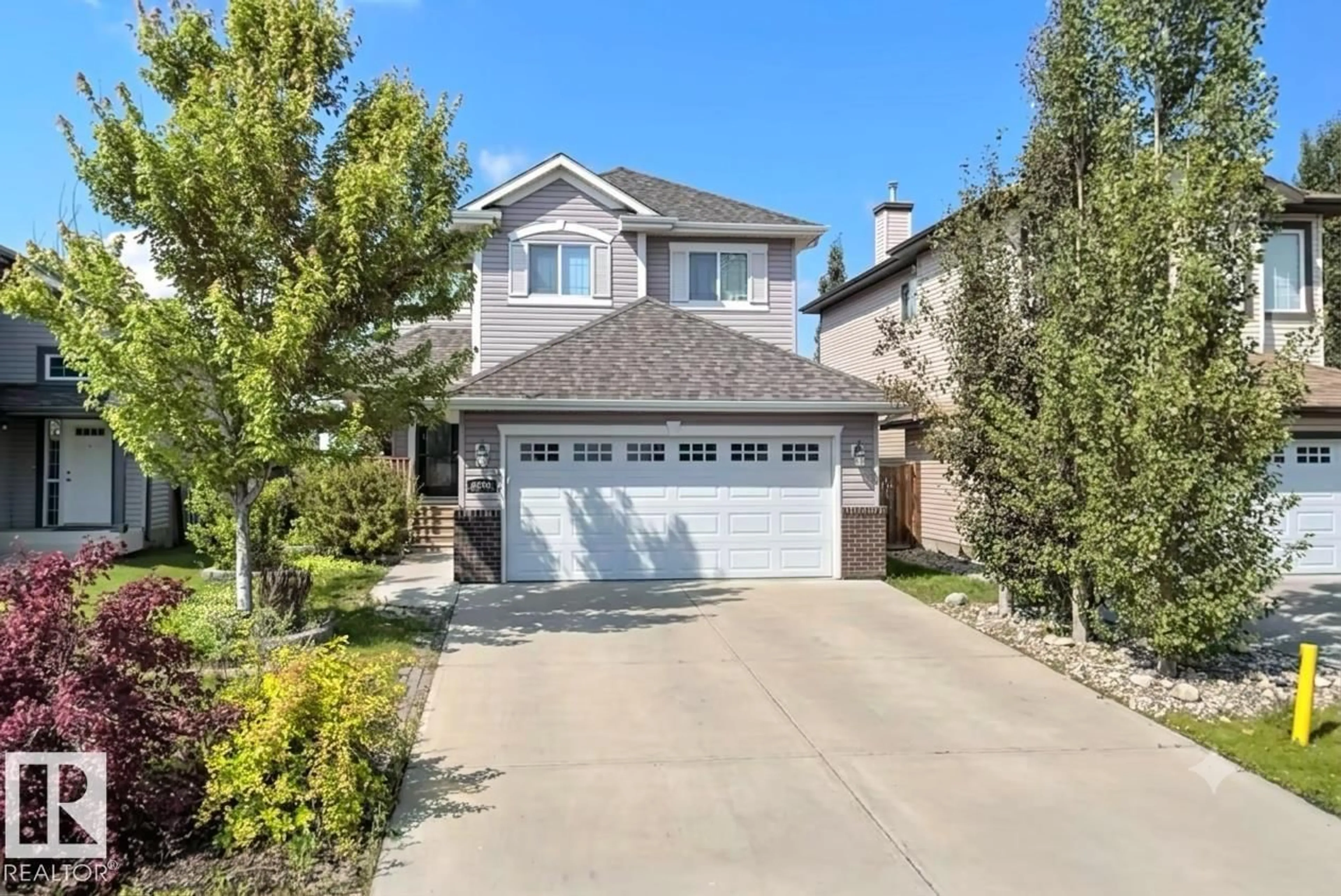 Home with vinyl exterior material, street for 9606 82 AV, Morinville Alberta T8R1W3