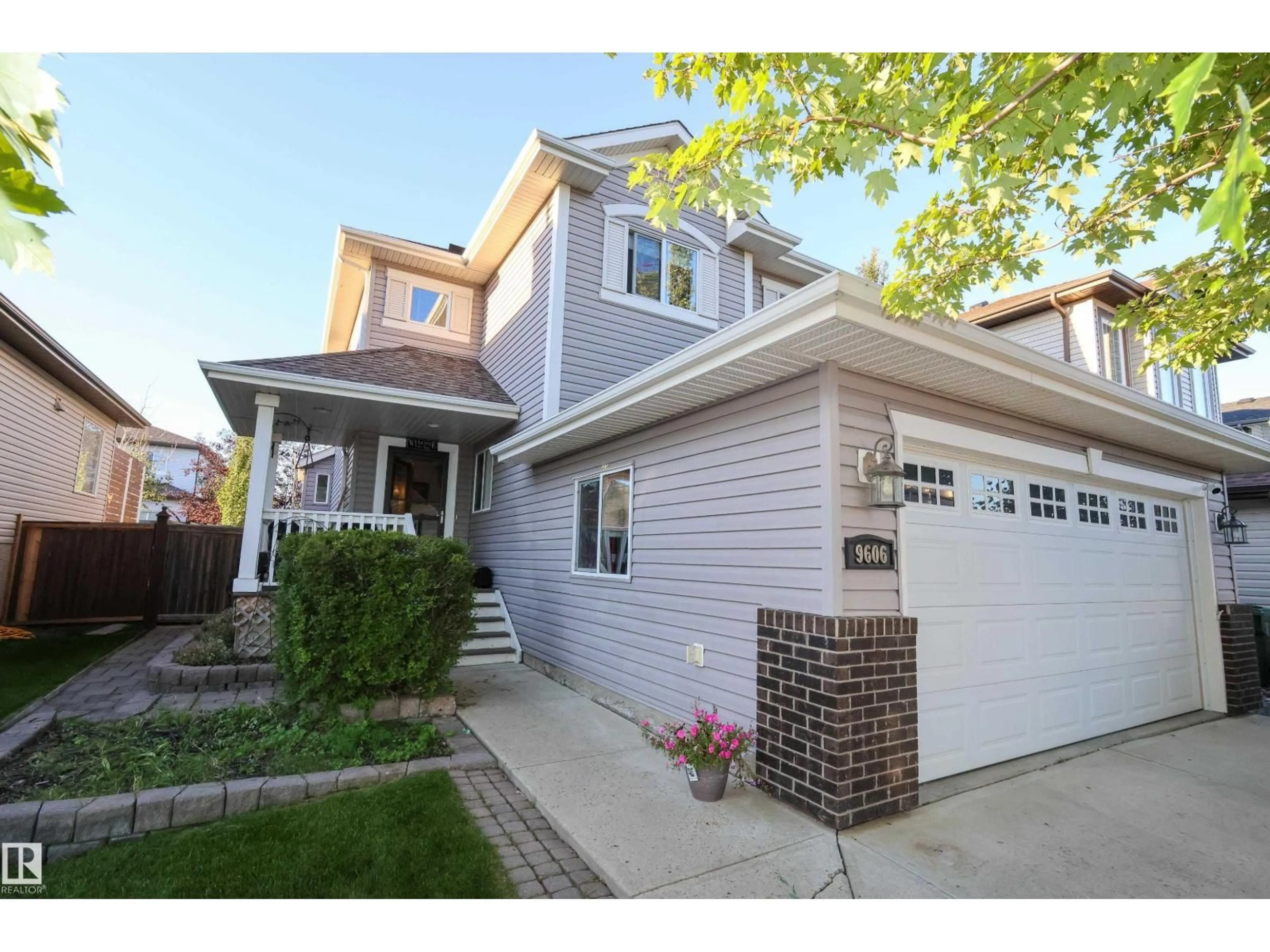 Home with vinyl exterior material, street for 9606 82 AV, Morinville Alberta T8R1W3