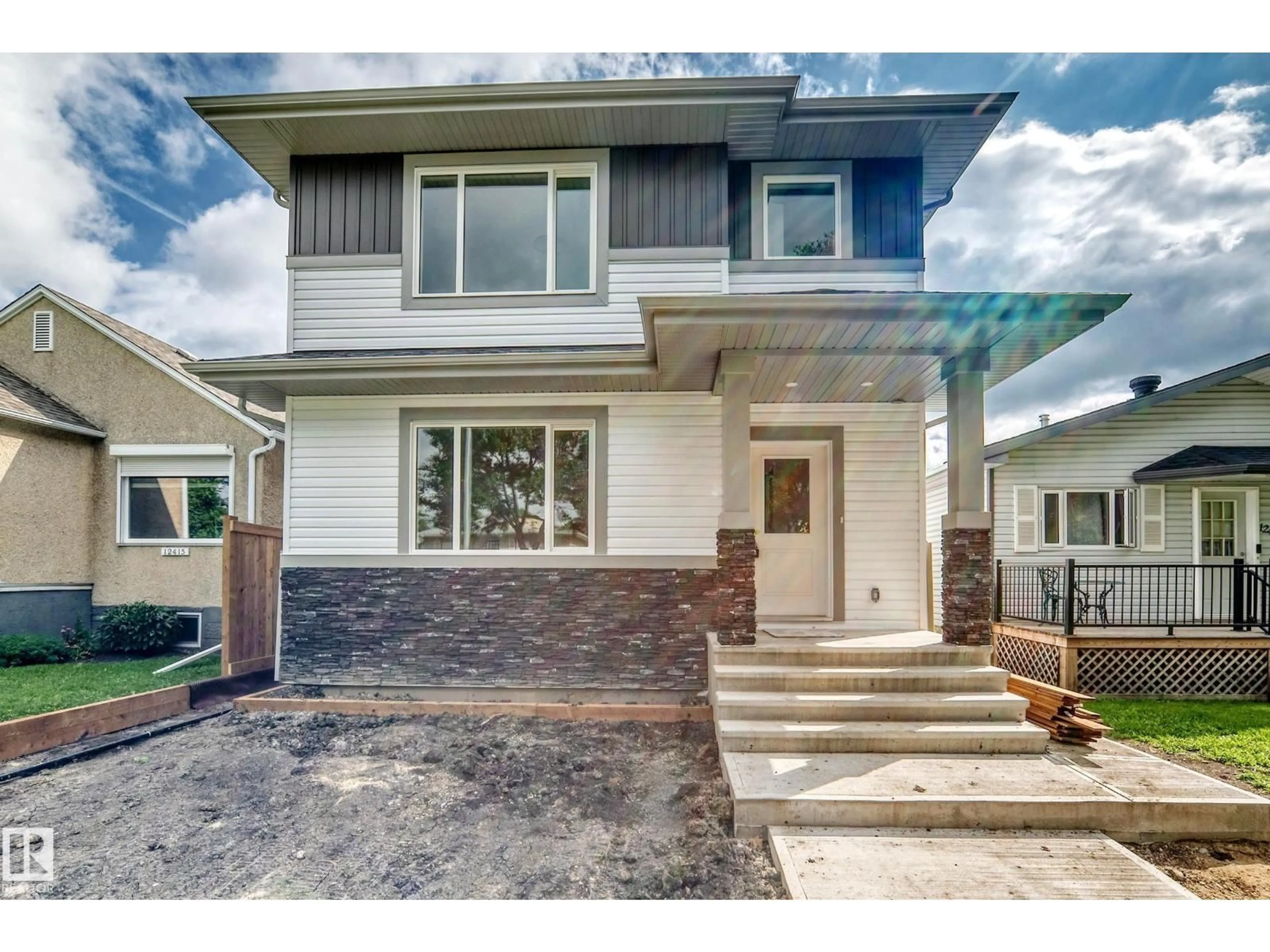 Home with vinyl exterior material, street for NW - 12411 86 ST, Edmonton Alberta T5B3L3