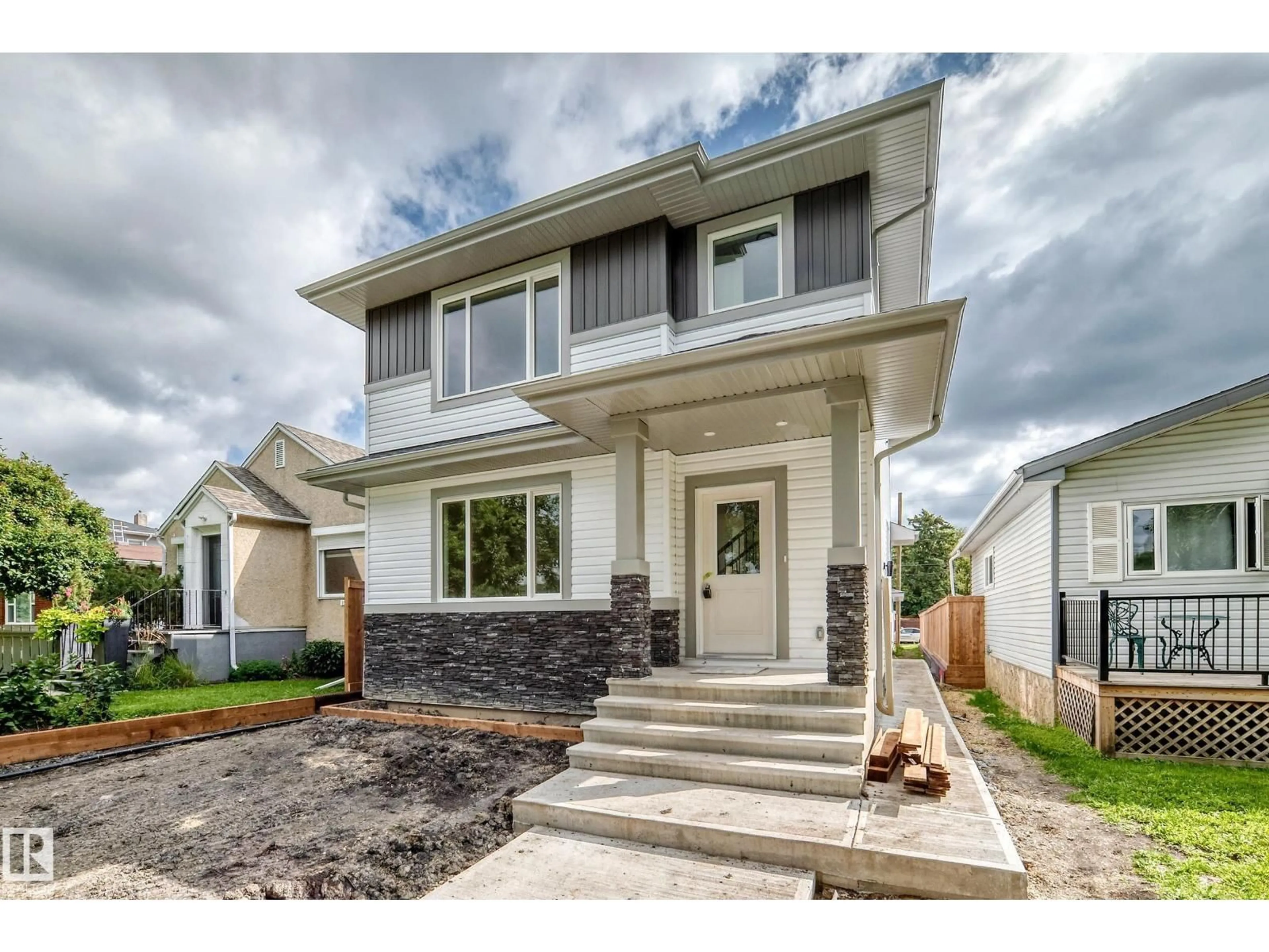Home with vinyl exterior material, street for NW - 12411 86 ST, Edmonton Alberta T5B3L3