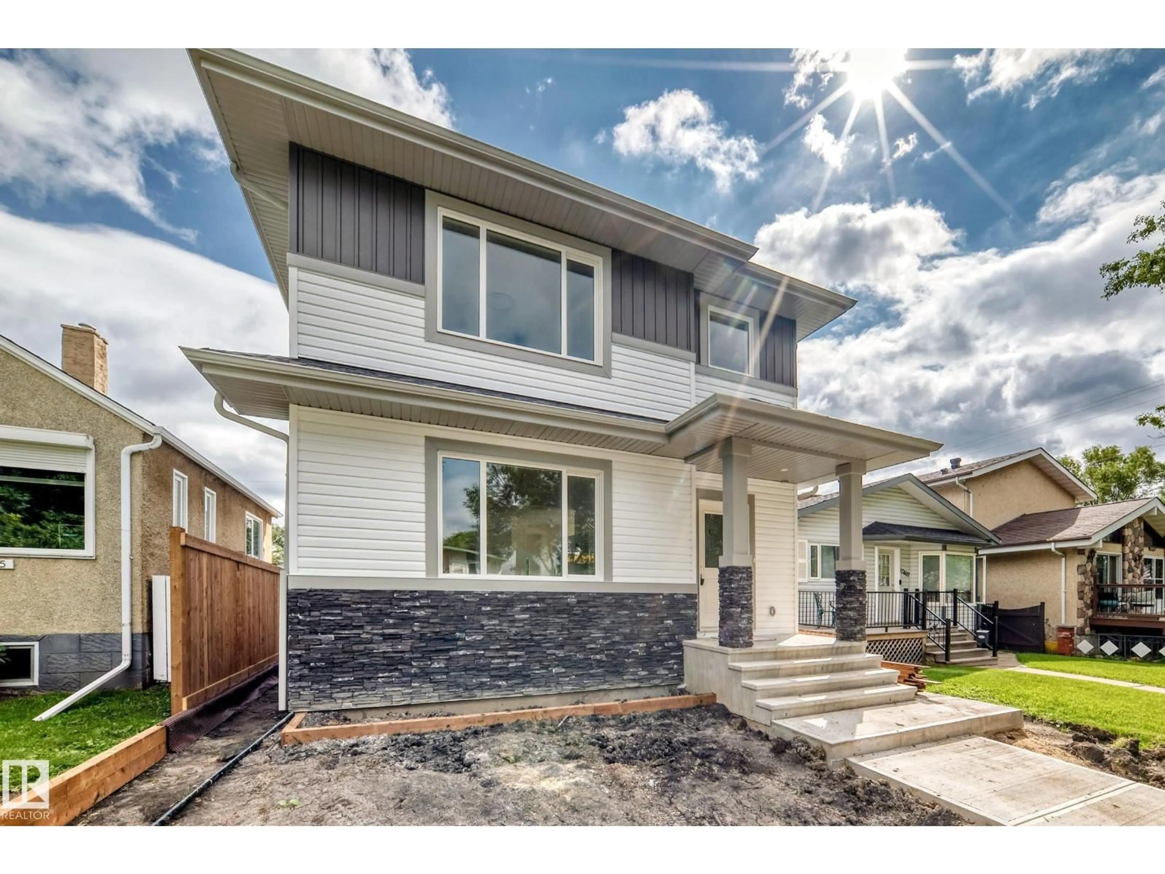 Home with vinyl exterior material, street for NW - 12411 86 ST, Edmonton Alberta T5B3L3