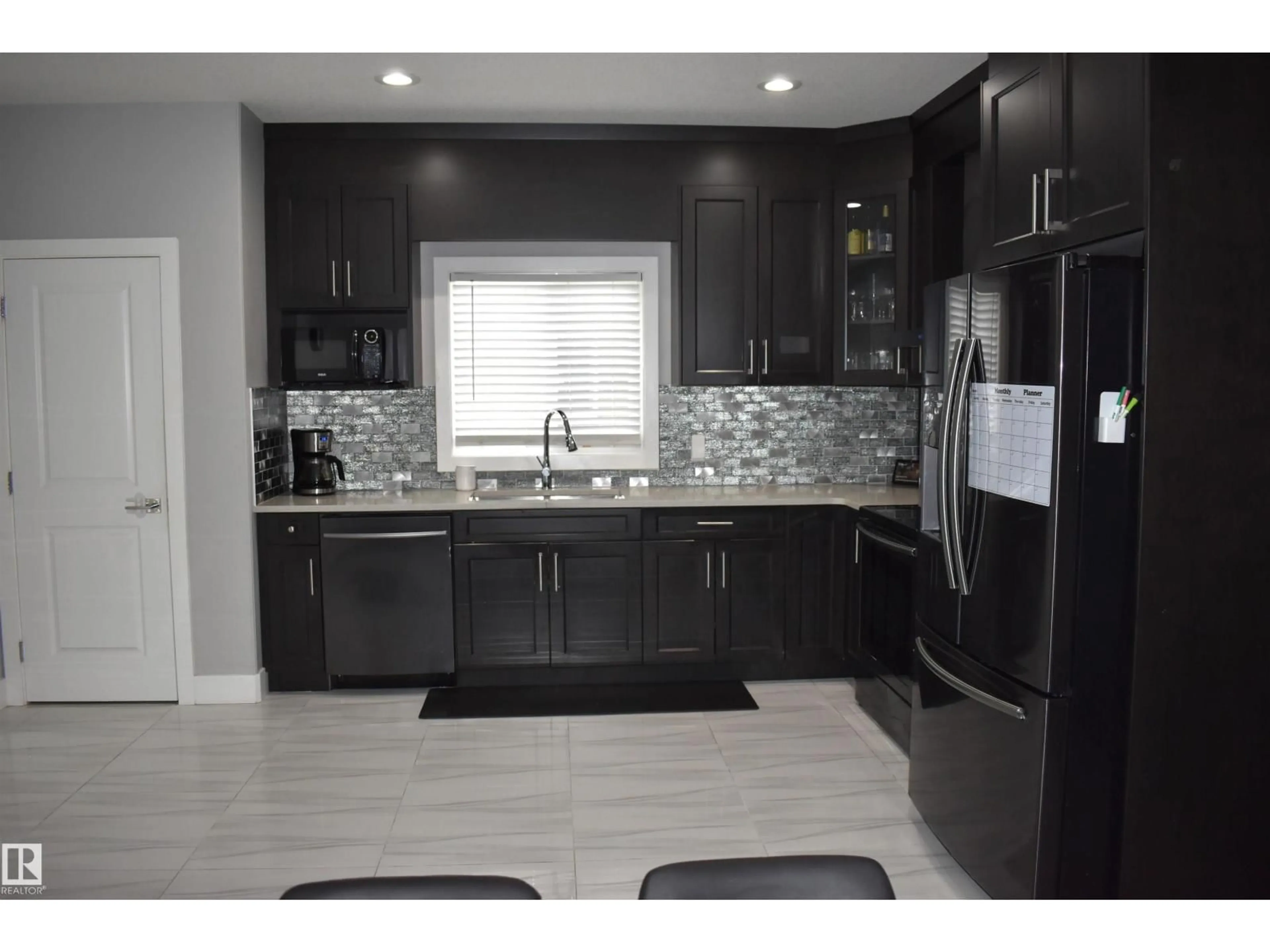 Open concept kitchen, ceramic/tile floor for NW - 10510 153 ST, Edmonton Alberta T5P2C3