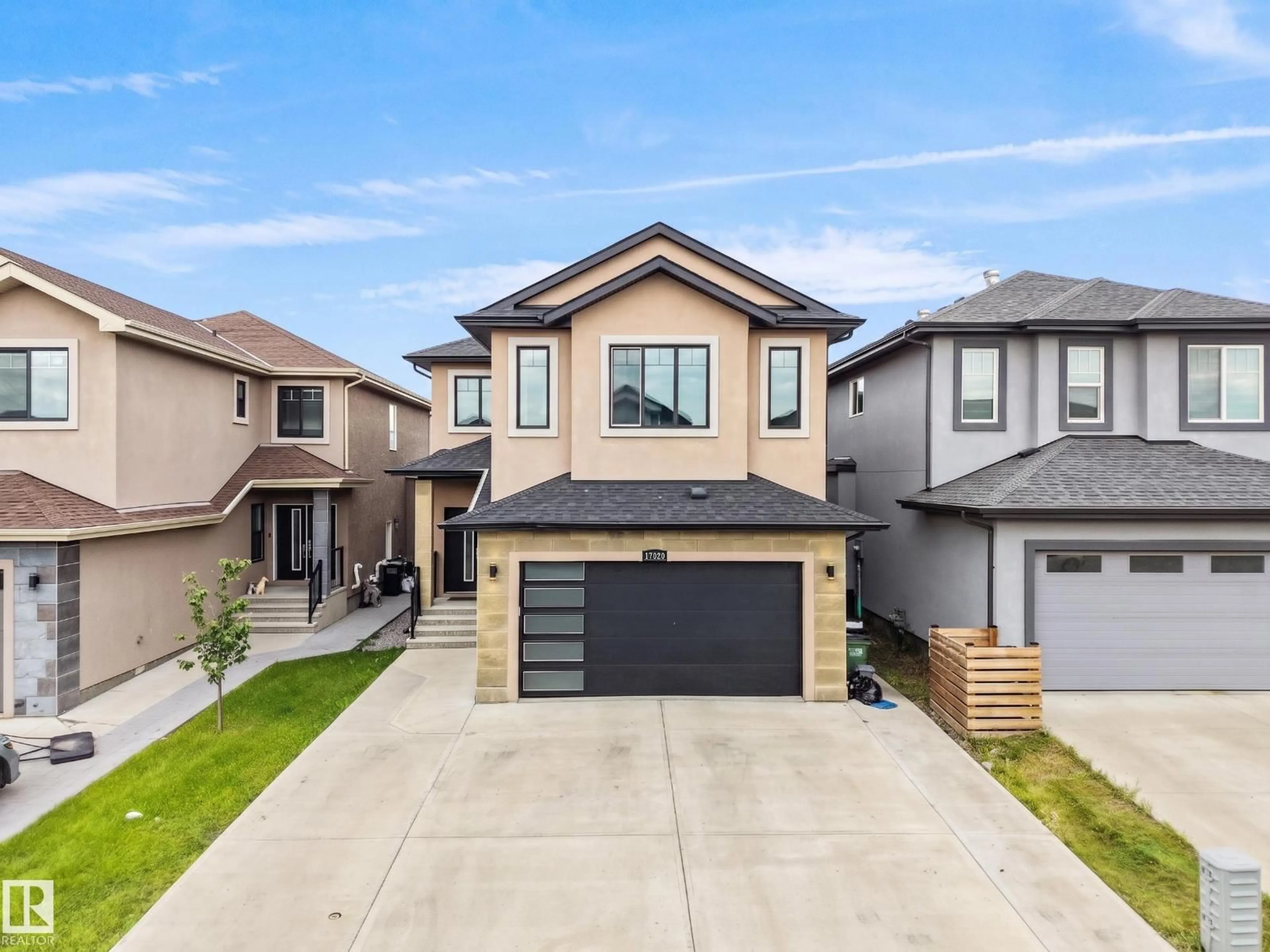 Home with vinyl exterior material, street for 17020 62 ST, Edmonton Alberta T5Y3S4