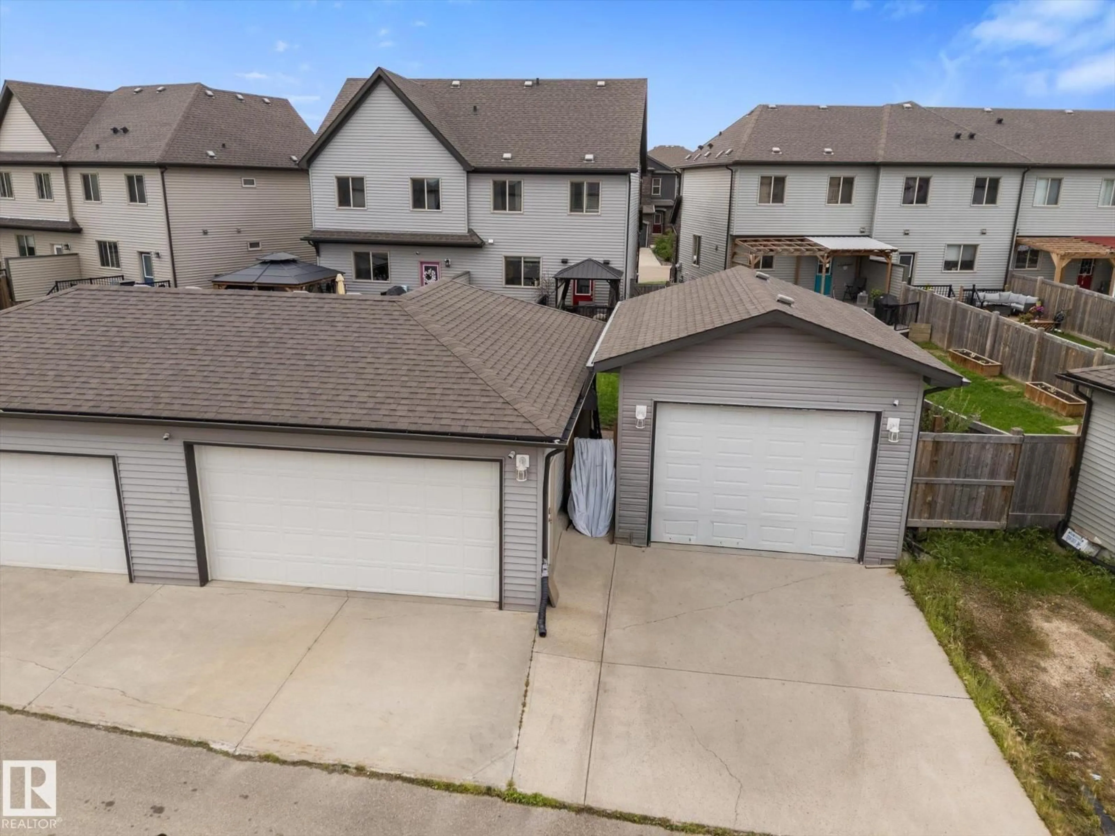A pic from outside/outdoor area/front of a property/back of a property/a pic from drone, street for 116 GILMORE WY, Spruce Grove Alberta T7X0M5
