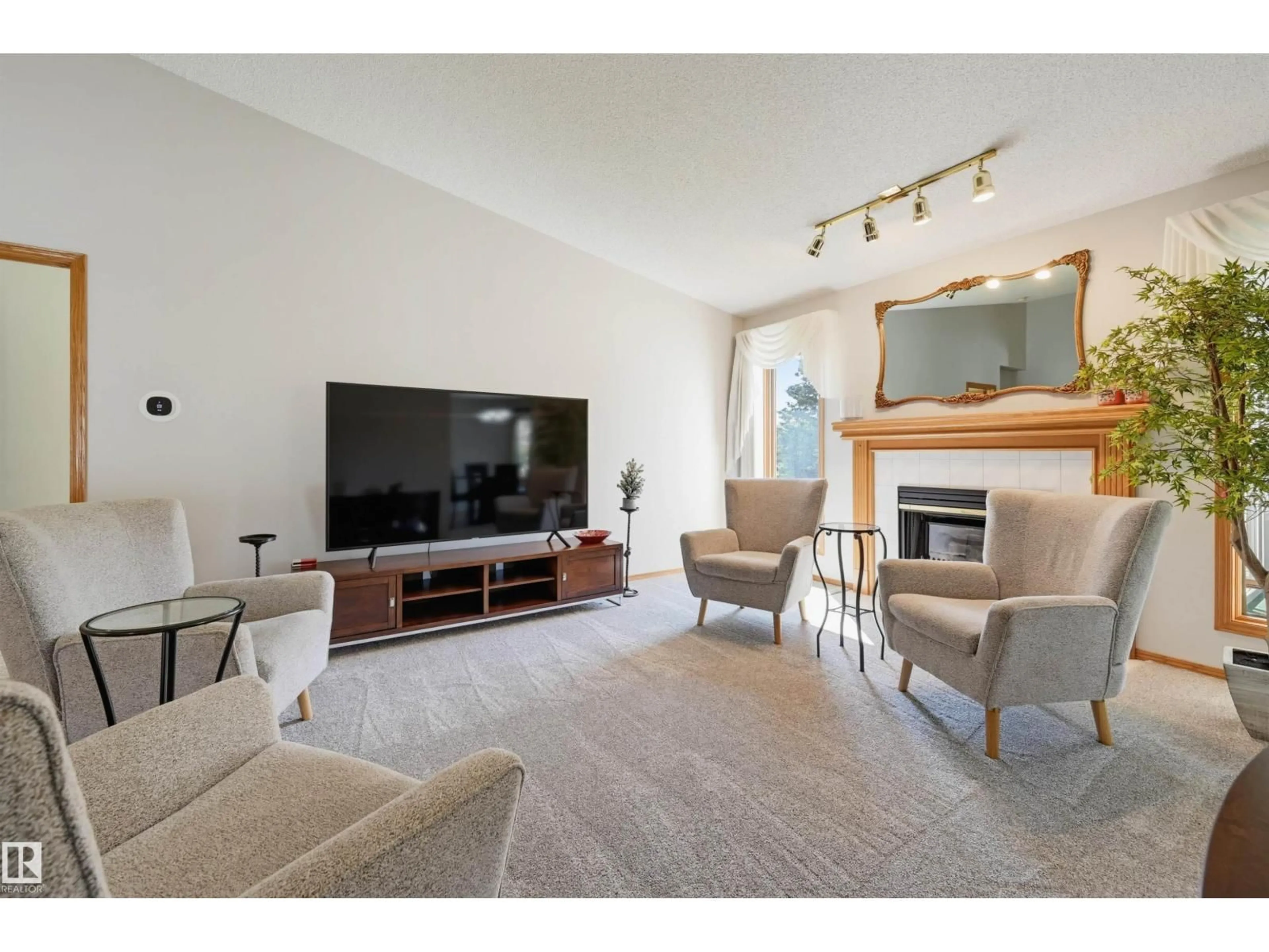 Living room with furniture, unknown for 619 REVELL WD, Edmonton Alberta T6R2H9
