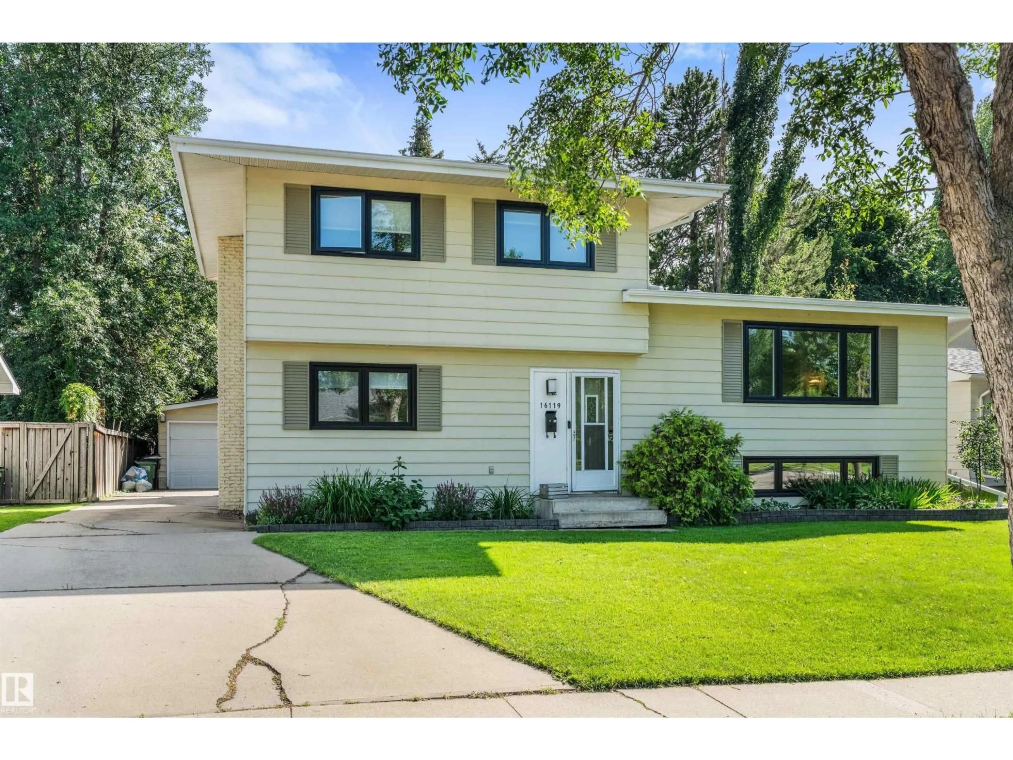Home with vinyl exterior material, street for 16119 78 AV, Edmonton Alberta T5R3E5