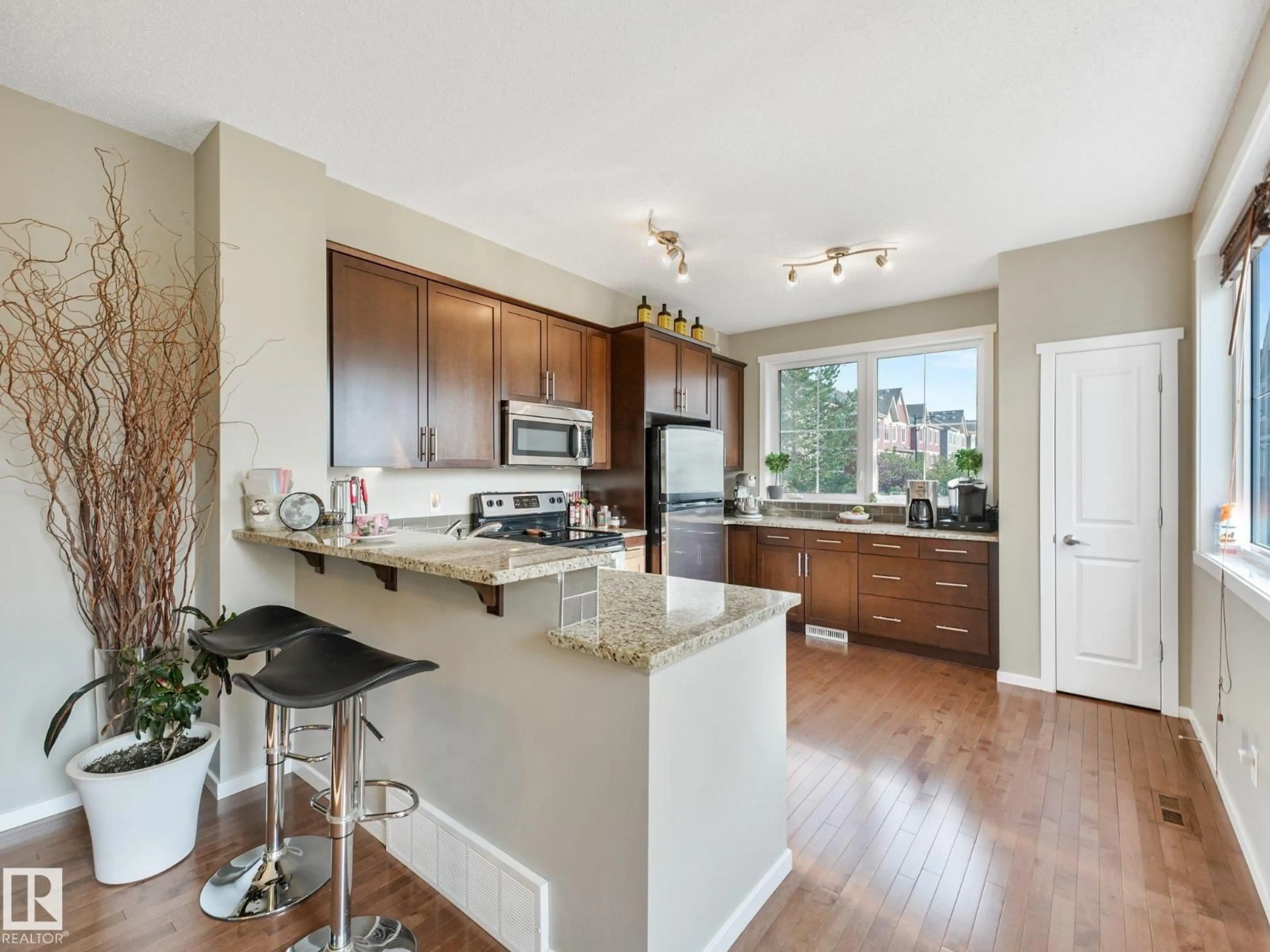 Open concept kitchen, unknown for 603 - 55 WATT BV, Edmonton Alberta T6X0P3